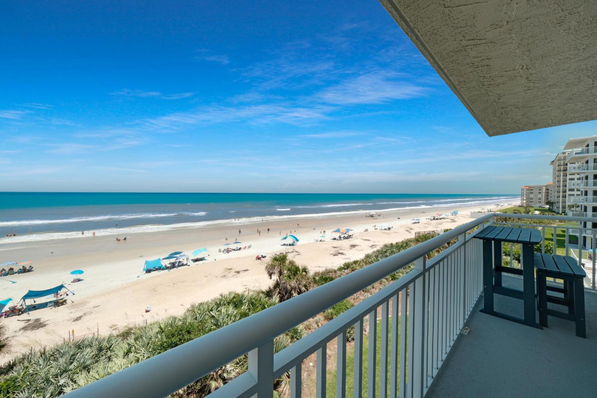 Fully renovated direct oceanfront condo with a large balcony, heated pool and beach access