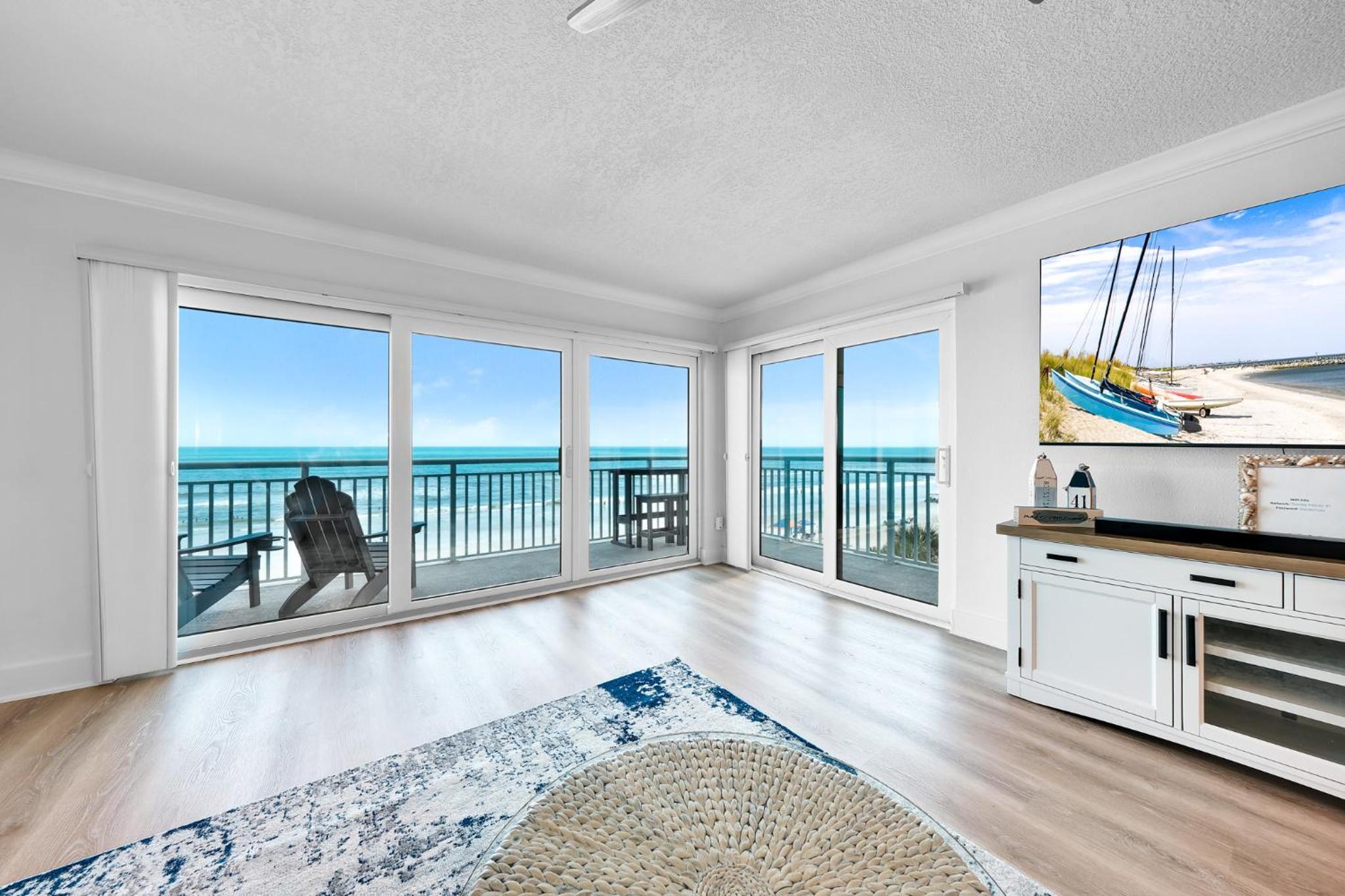 Fully renovated direct oceanfront condo with a large balcony, heated pool and beach access