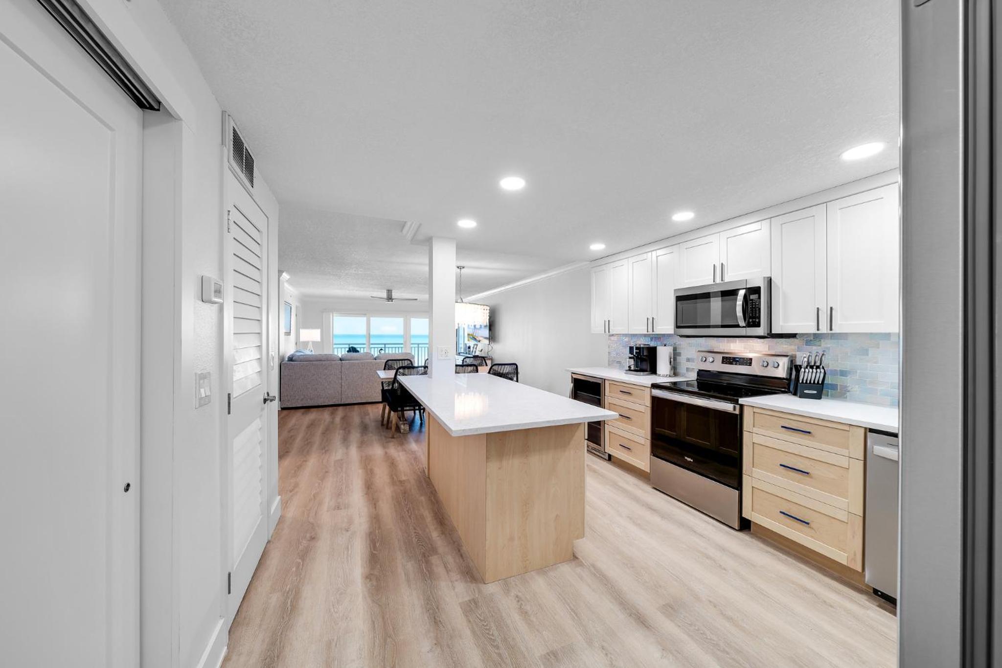 Fully renovated direct oceanfront condo with a large balcony, heated pool and beach access