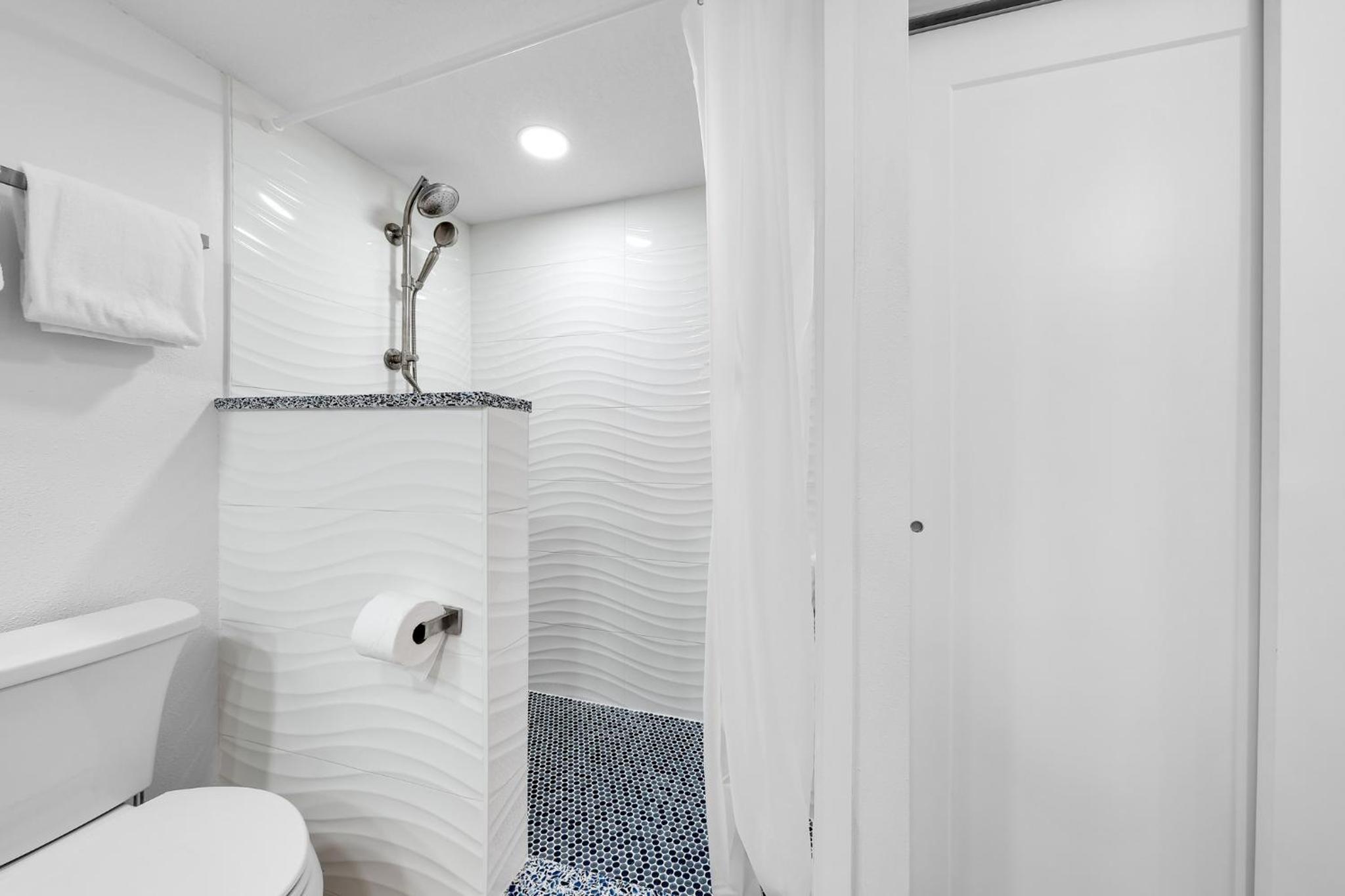 Fully renovated direct oceanfront condo with a large balcony, heated pool and beach access