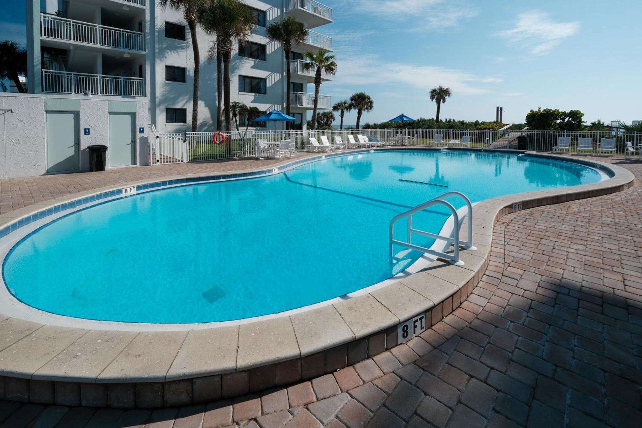 Fully renovated direct oceanfront condo with a large balcony, heated pool and beach access