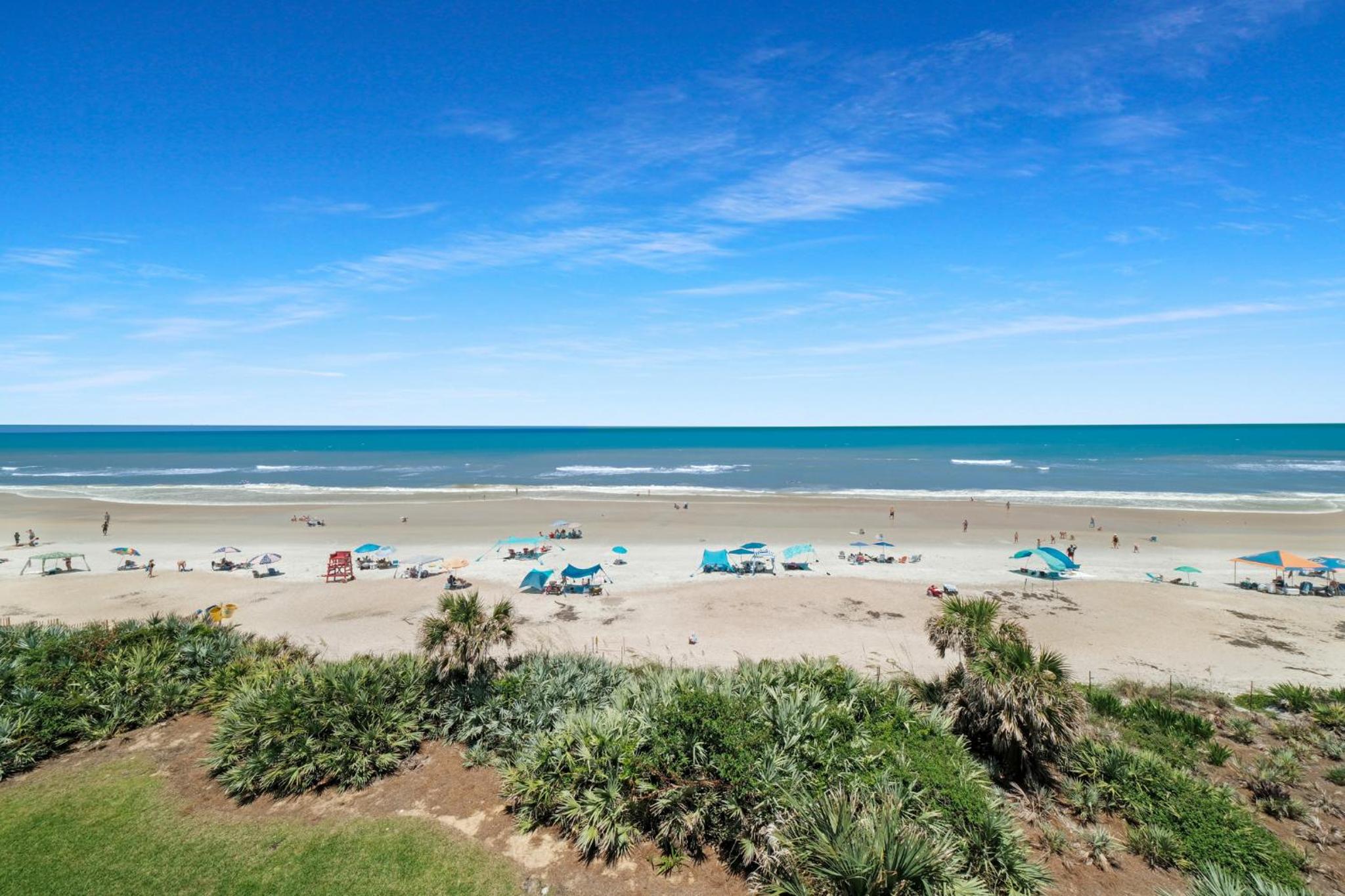 Fully renovated direct oceanfront condo with a large balcony, heated pool and beach access