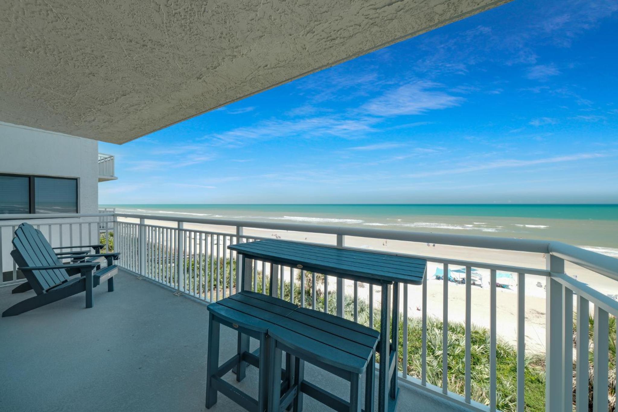 Fully renovated direct oceanfront condo with a large balcony, heated pool and beach access