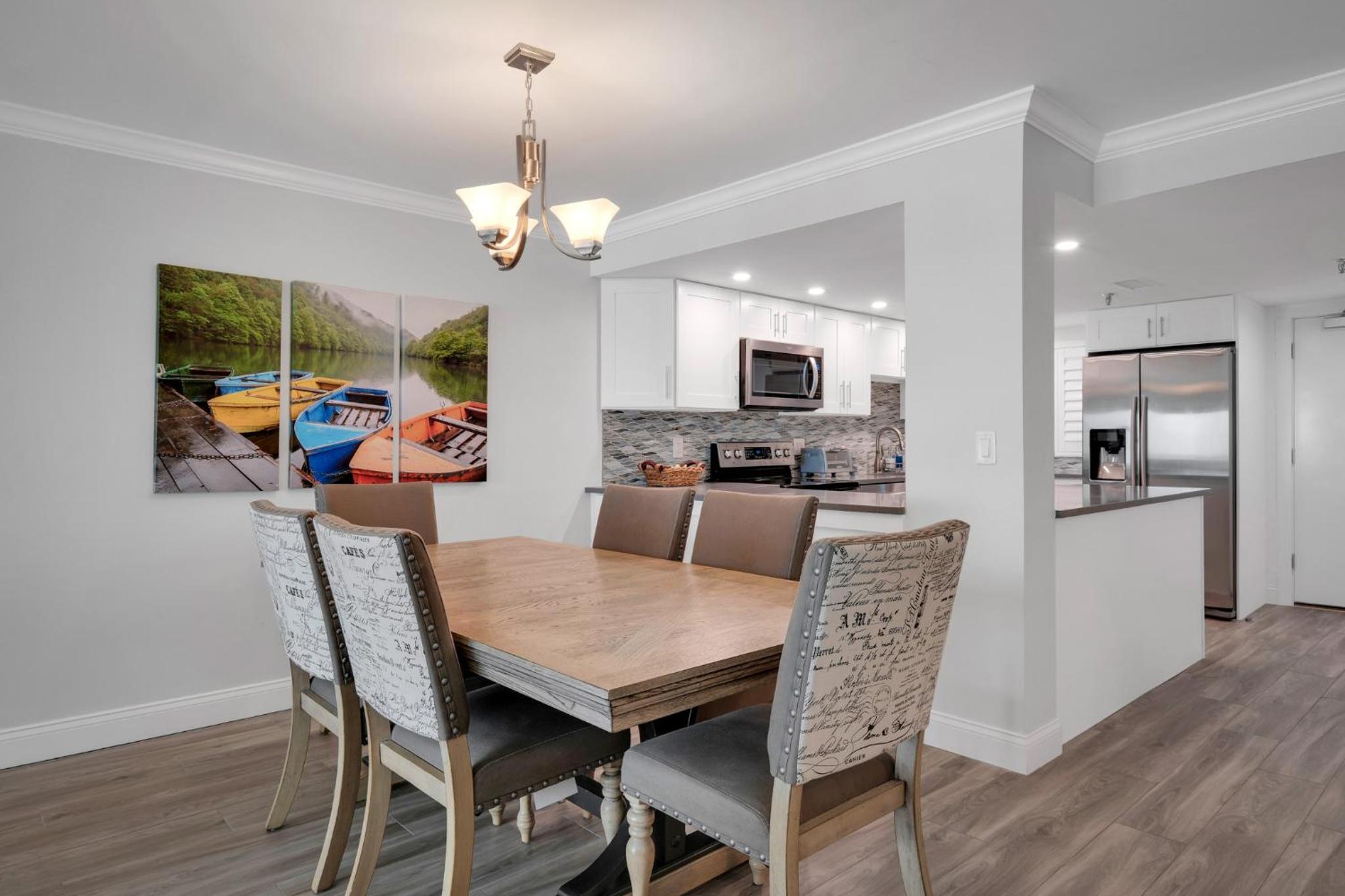 Direct oceanfront condo with a large balcony and a heated beachfront pool