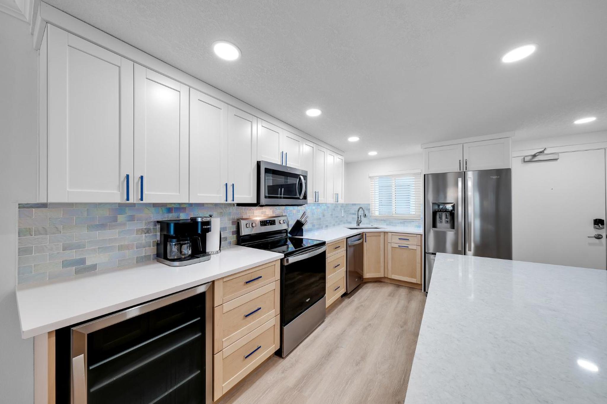 Fully renovated direct oceanfront condo with a large balcony, heated pool and beach access