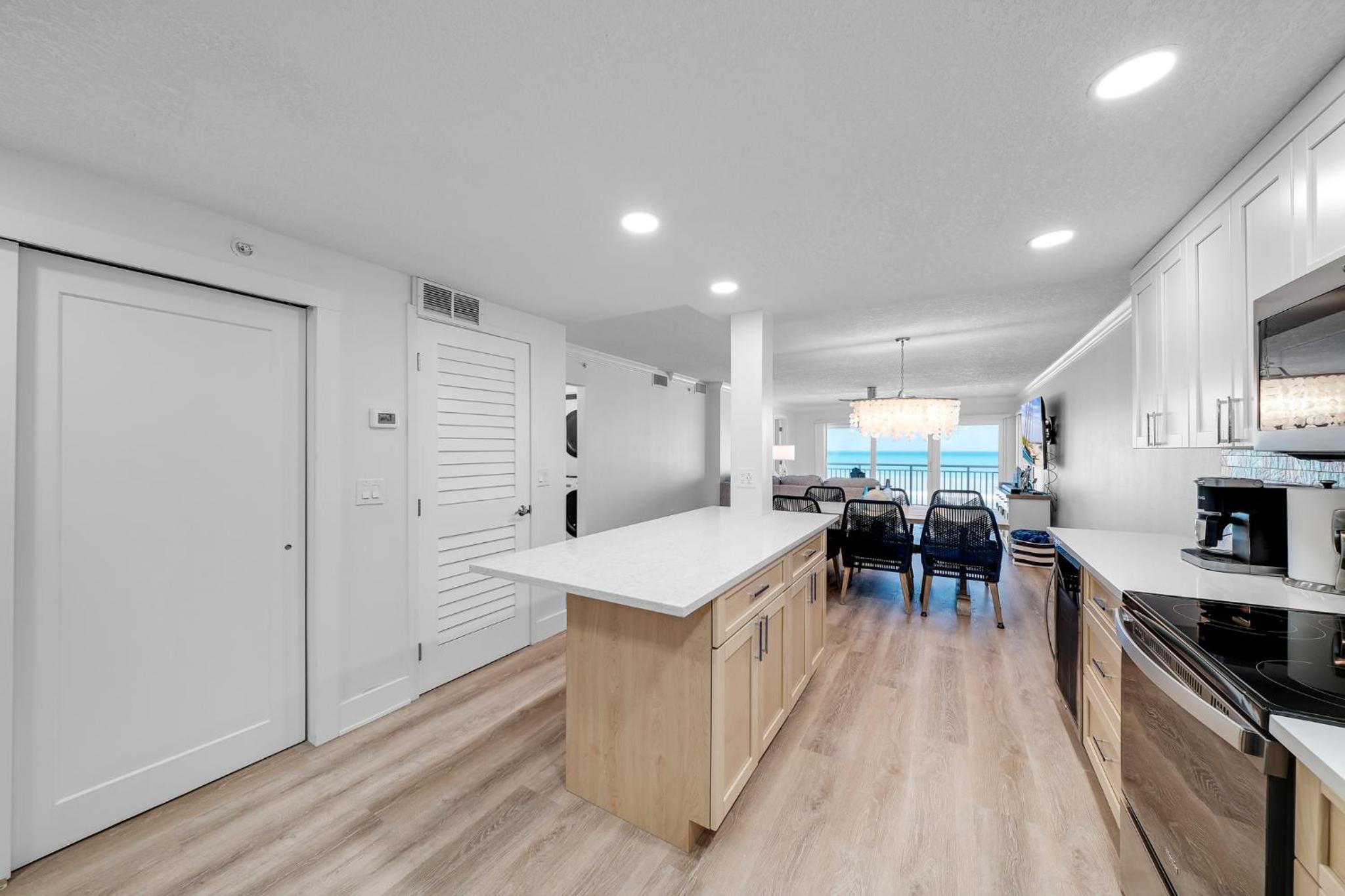 Fully renovated direct oceanfront condo with a large balcony, heated pool and beach access