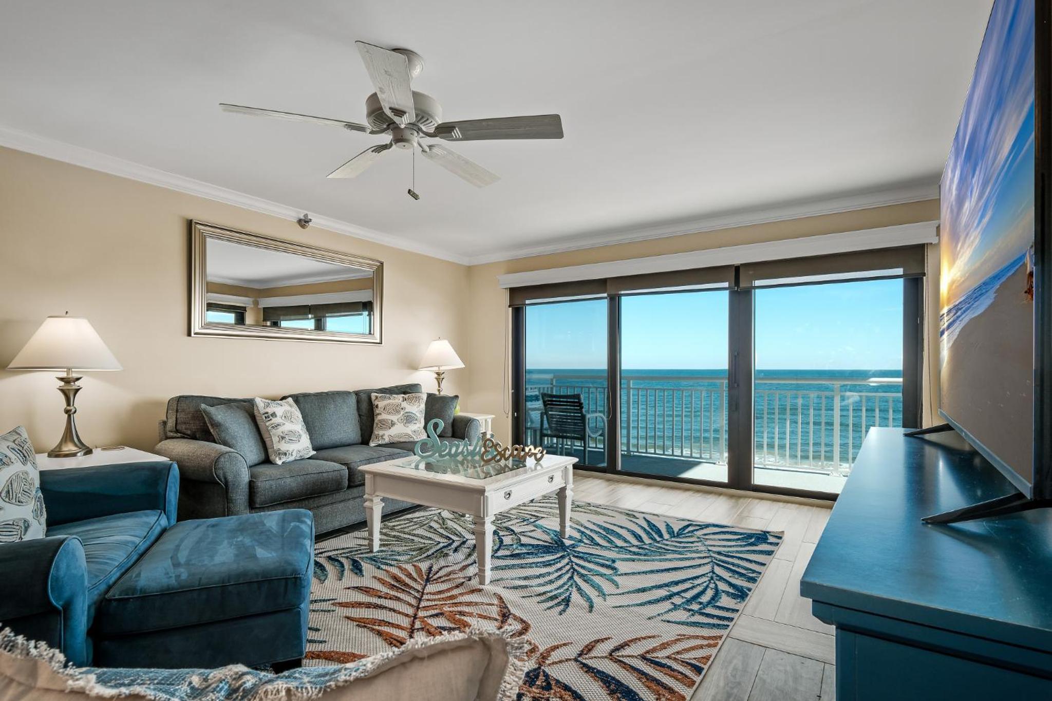 Direct oceanfront condo with a large balcony and a heated beachfront pool