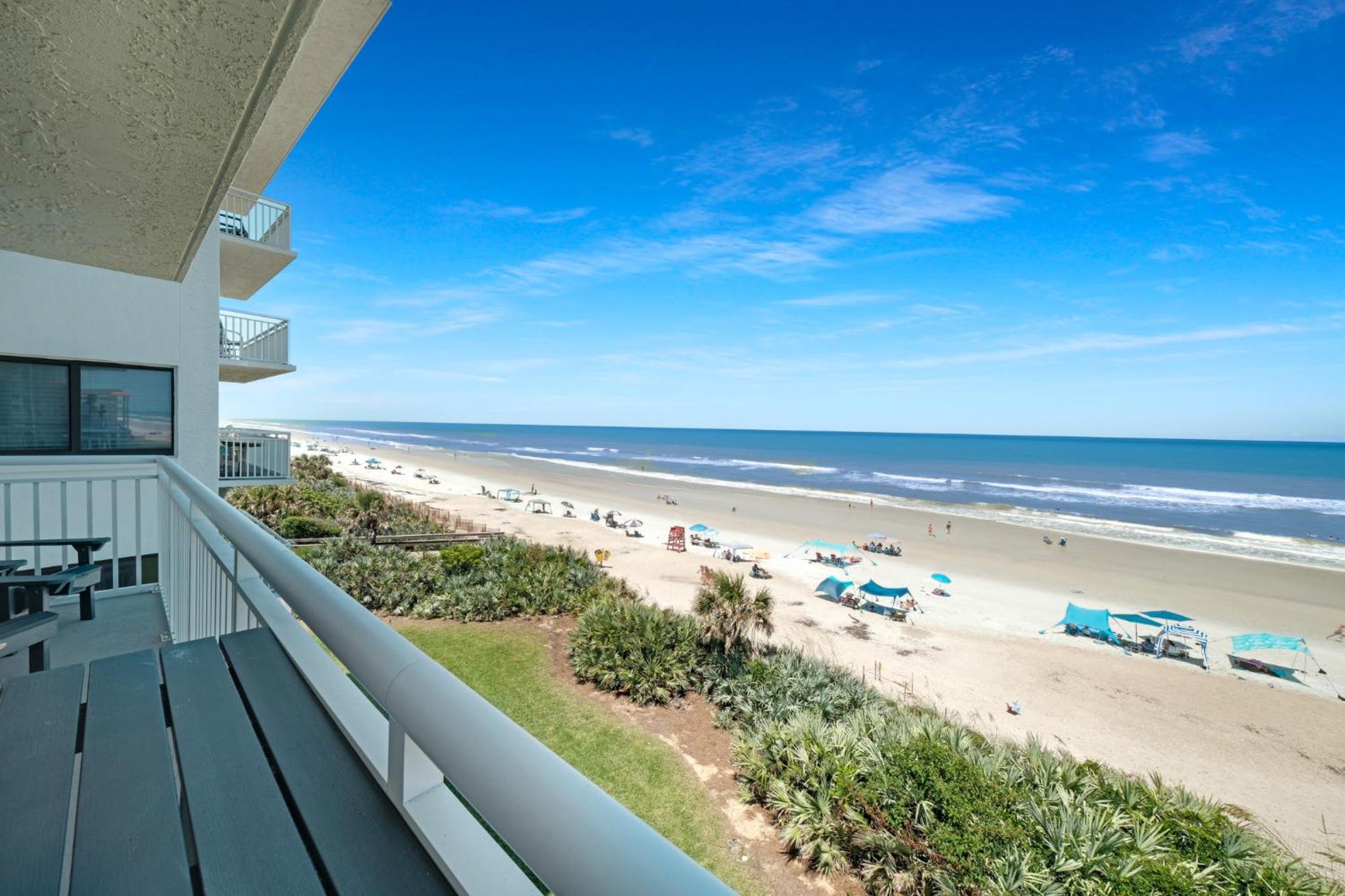Fully renovated direct oceanfront condo with a large balcony, heated pool and beach access