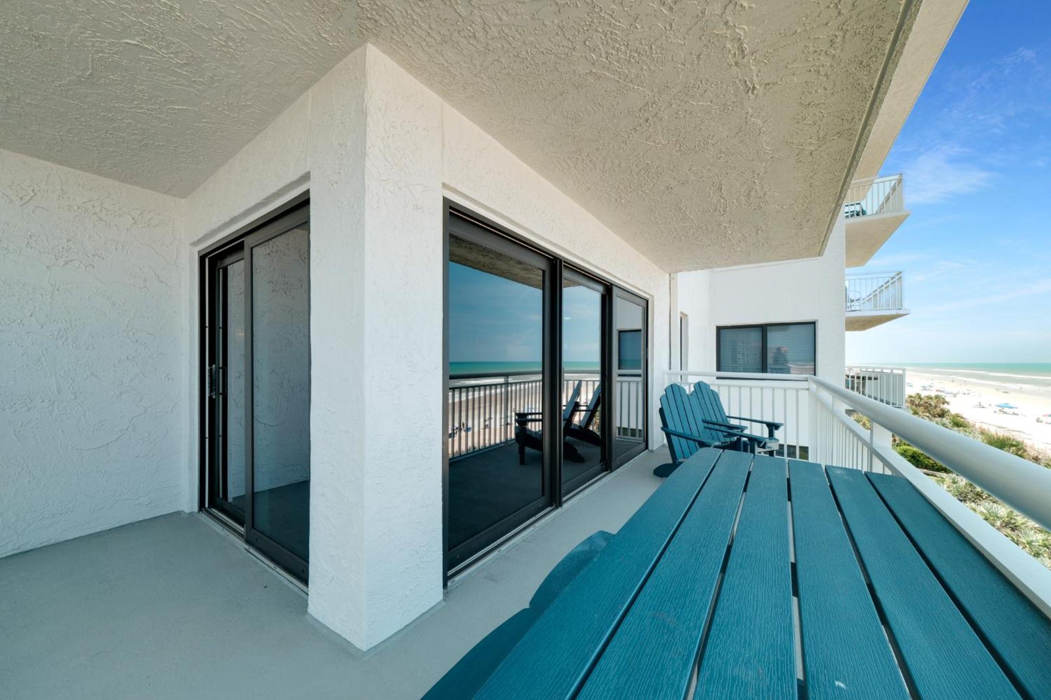 Fully renovated direct oceanfront condo with a large balcony, heated pool and beach access