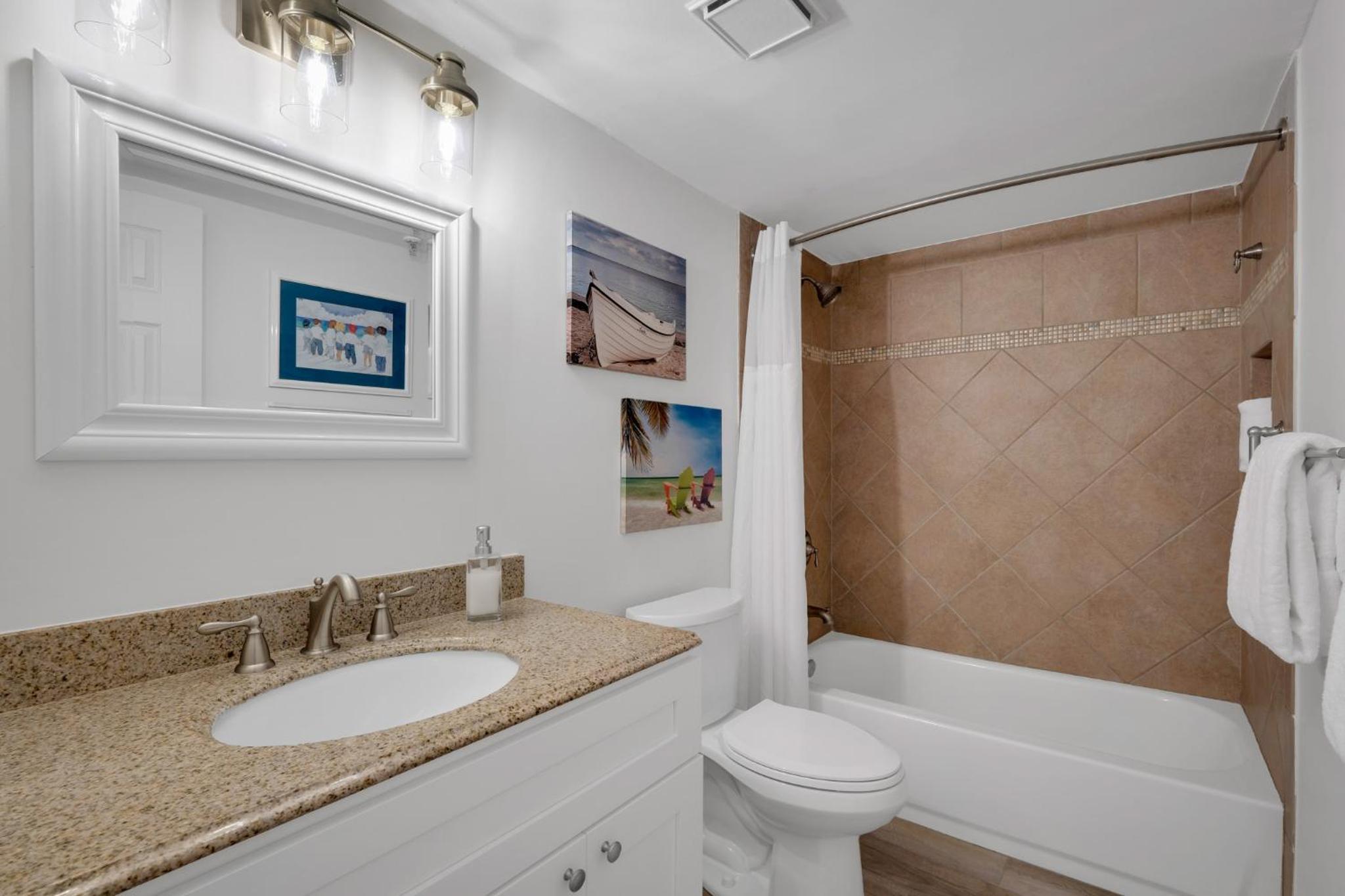 Direct oceanfront condo with a large balcony and a heated beachfront pool