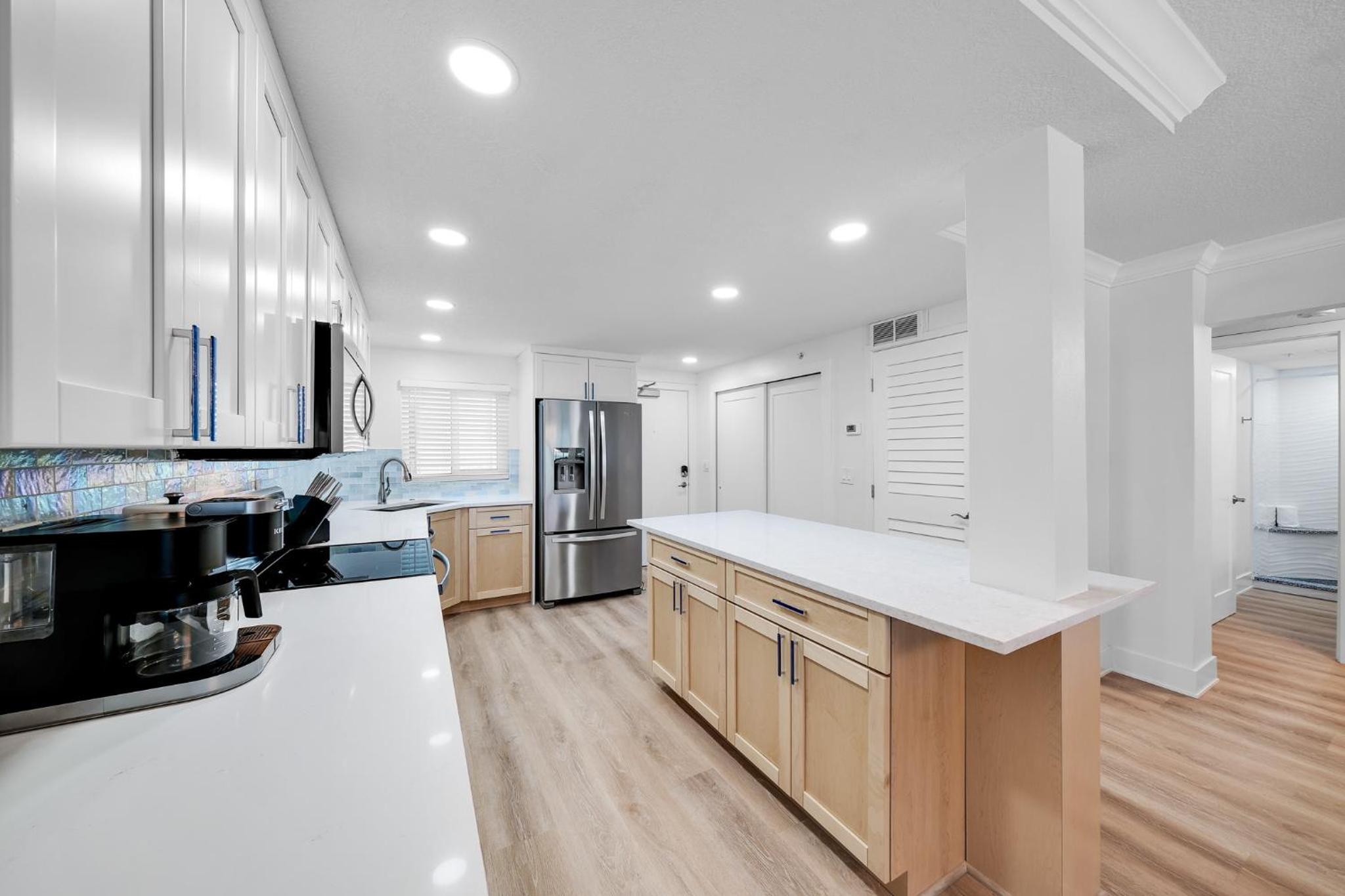 Fully renovated direct oceanfront condo with a large balcony, heated pool and beach access