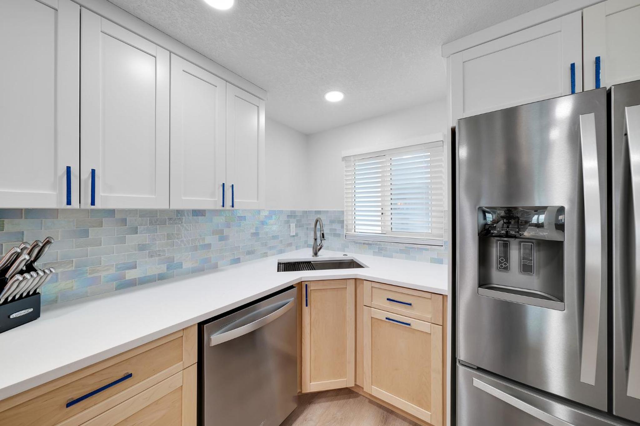 Fully renovated direct oceanfront condo with a large balcony, heated pool and beach access