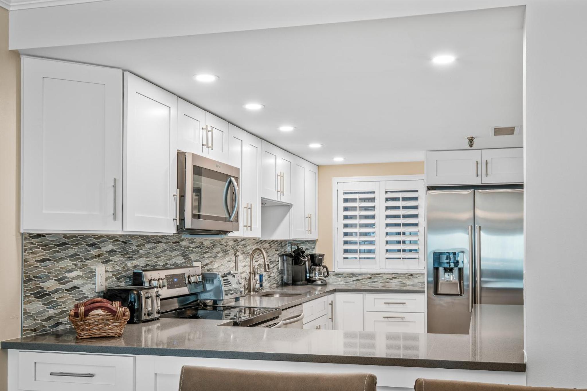 Direct oceanfront condo with a large balcony and a heated beachfront pool