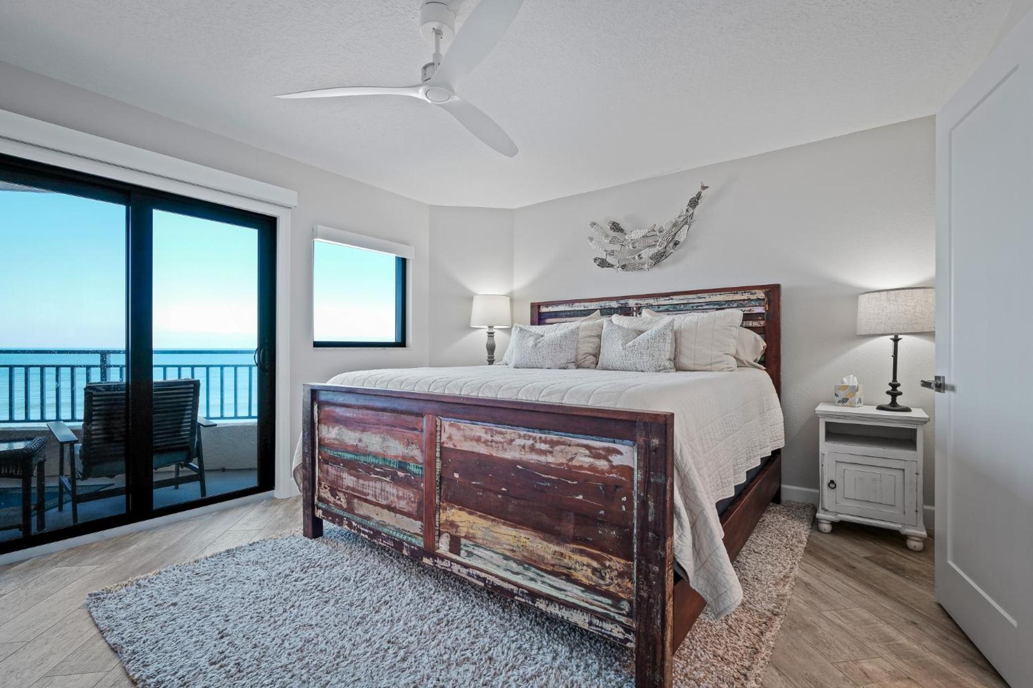 Stunning direct oceanfront condo with a balcony, hot tub, and heated pool