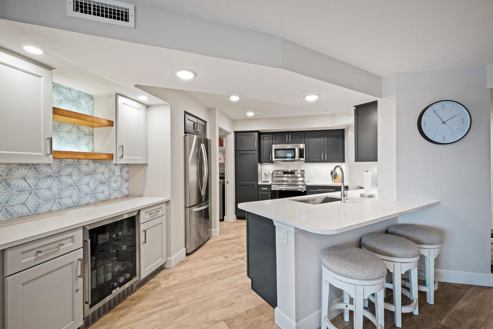Stunning direct oceanfront condo with a balcony, hot tub, and heated pool