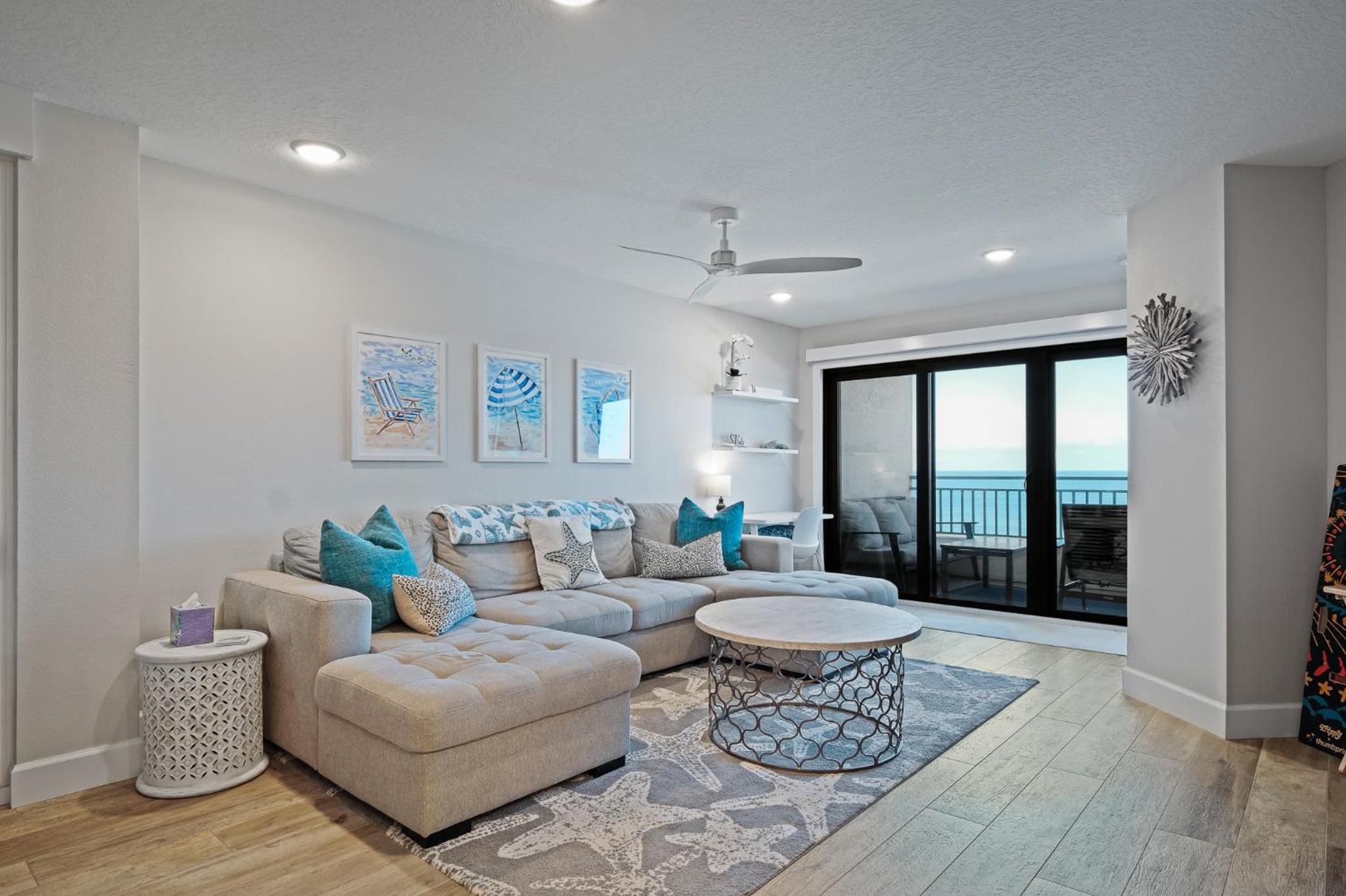 Stunning direct oceanfront condo with a balcony, hot tub, and heated pool