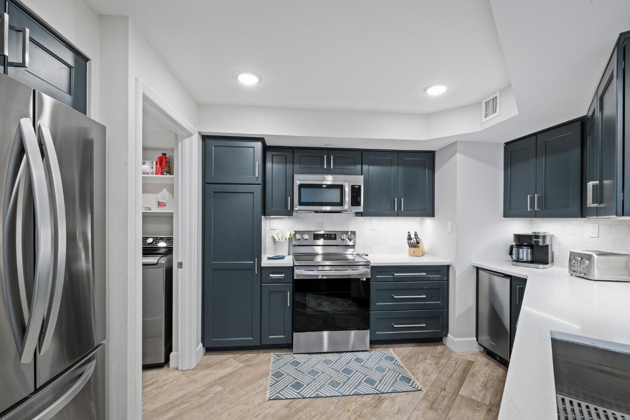 Stunning direct oceanfront condo with a balcony, hot tub, and heated pool