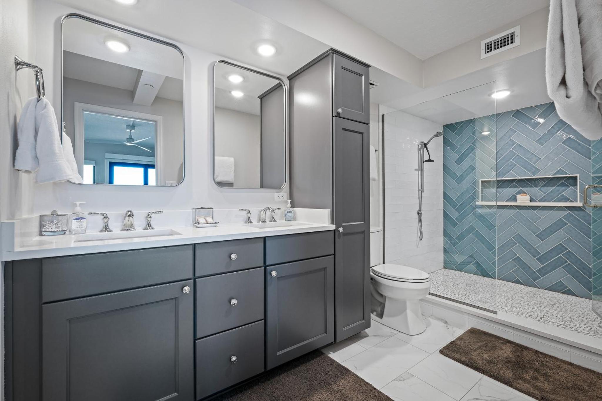Stunning direct oceanfront condo with a balcony, hot tub, and heated pool