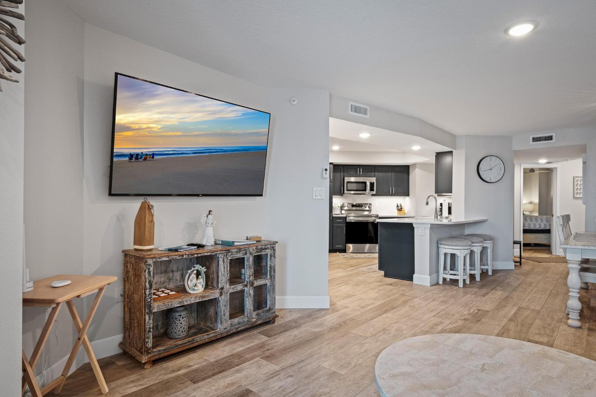 Stunning direct oceanfront condo with a balcony, hot tub, and heated pool