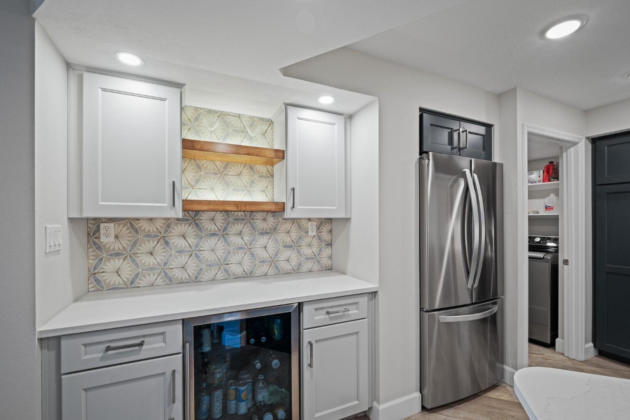 Stunning direct oceanfront condo with a balcony, hot tub, and heated pool