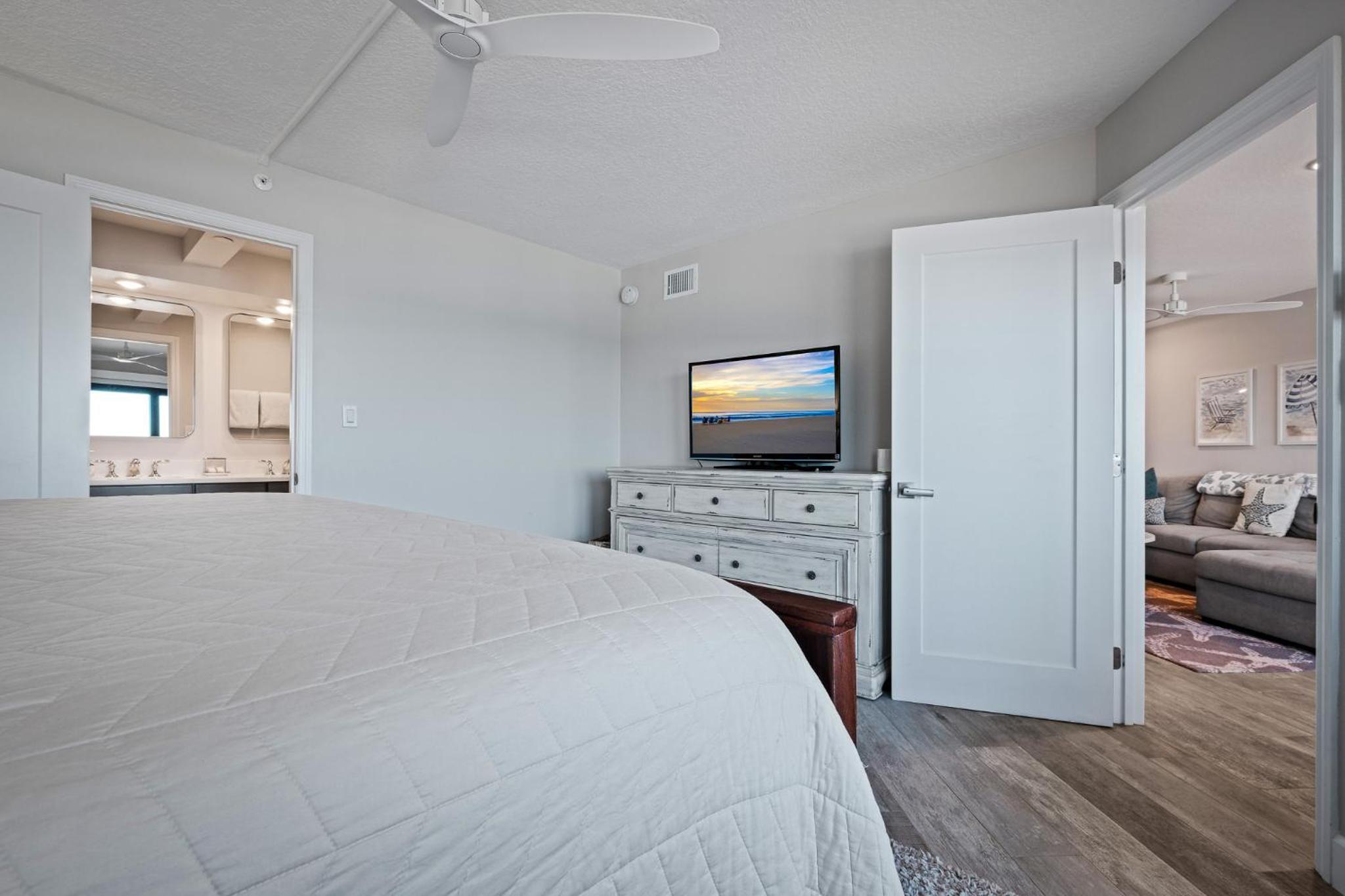 Stunning direct oceanfront condo with a balcony, hot tub, and heated pool