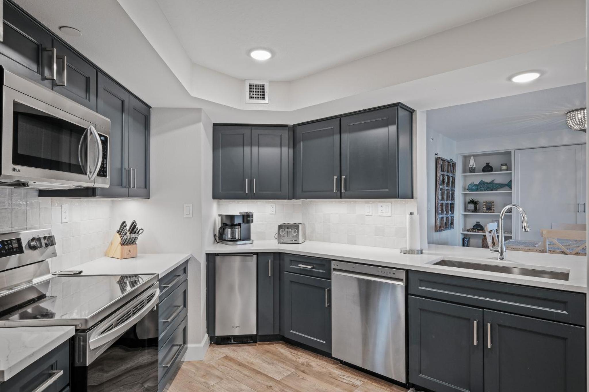 Stunning direct oceanfront condo with a balcony, hot tub, and heated pool