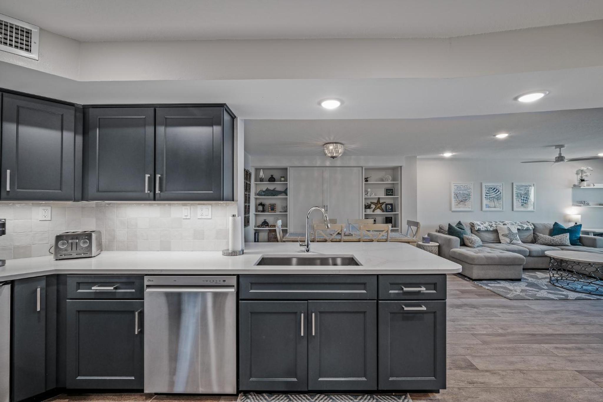 Stunning direct oceanfront condo with a balcony, hot tub, and heated pool