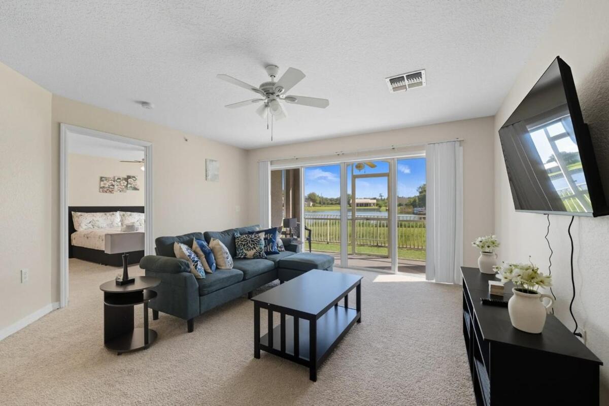 Spacious 2BR Condo Near Disney with Pool & Basketball