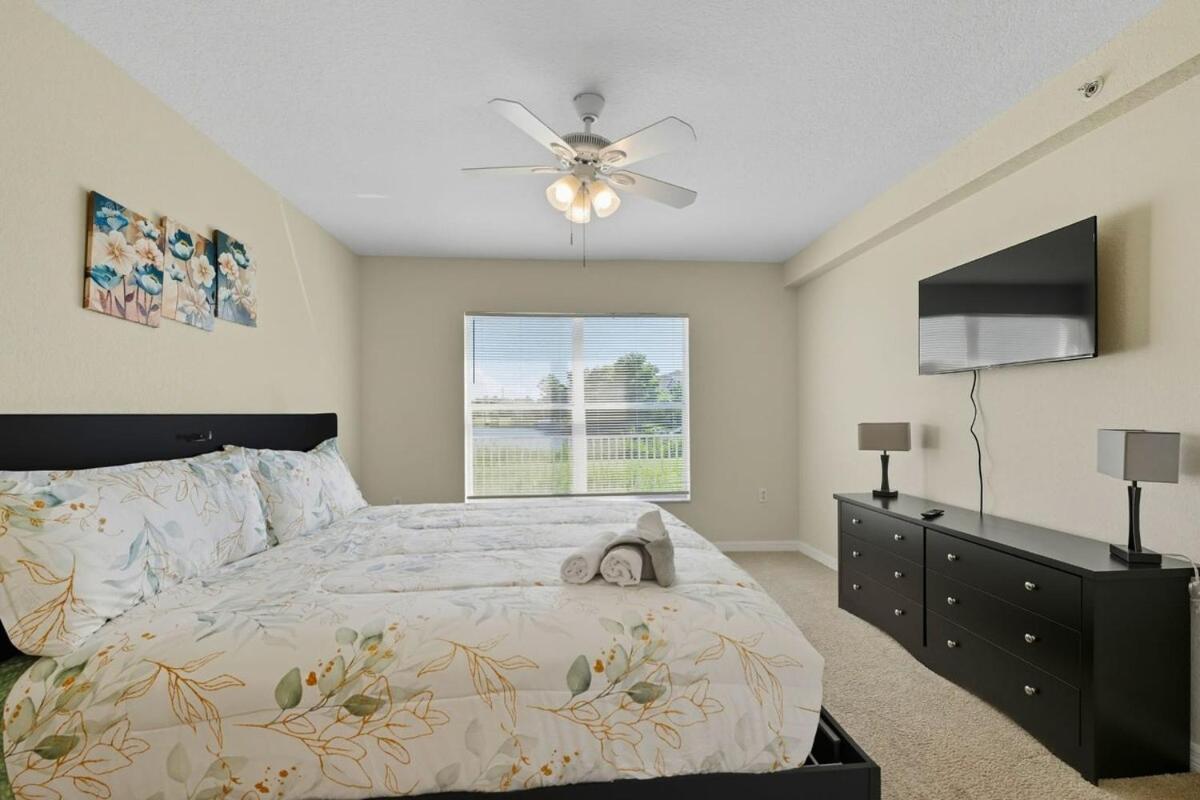 Spacious 2BR Condo Near Disney with Pool & Basketball