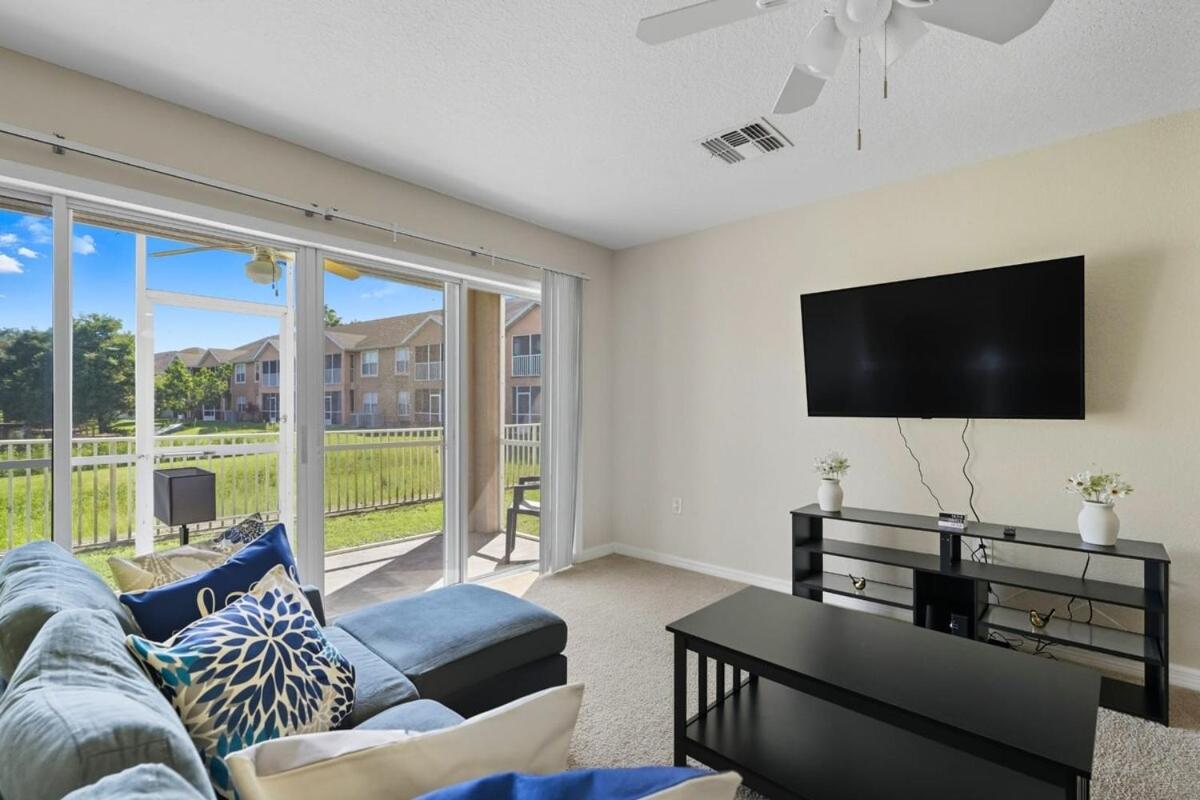 Spacious 2BR Condo Near Disney with Pool & Basketball