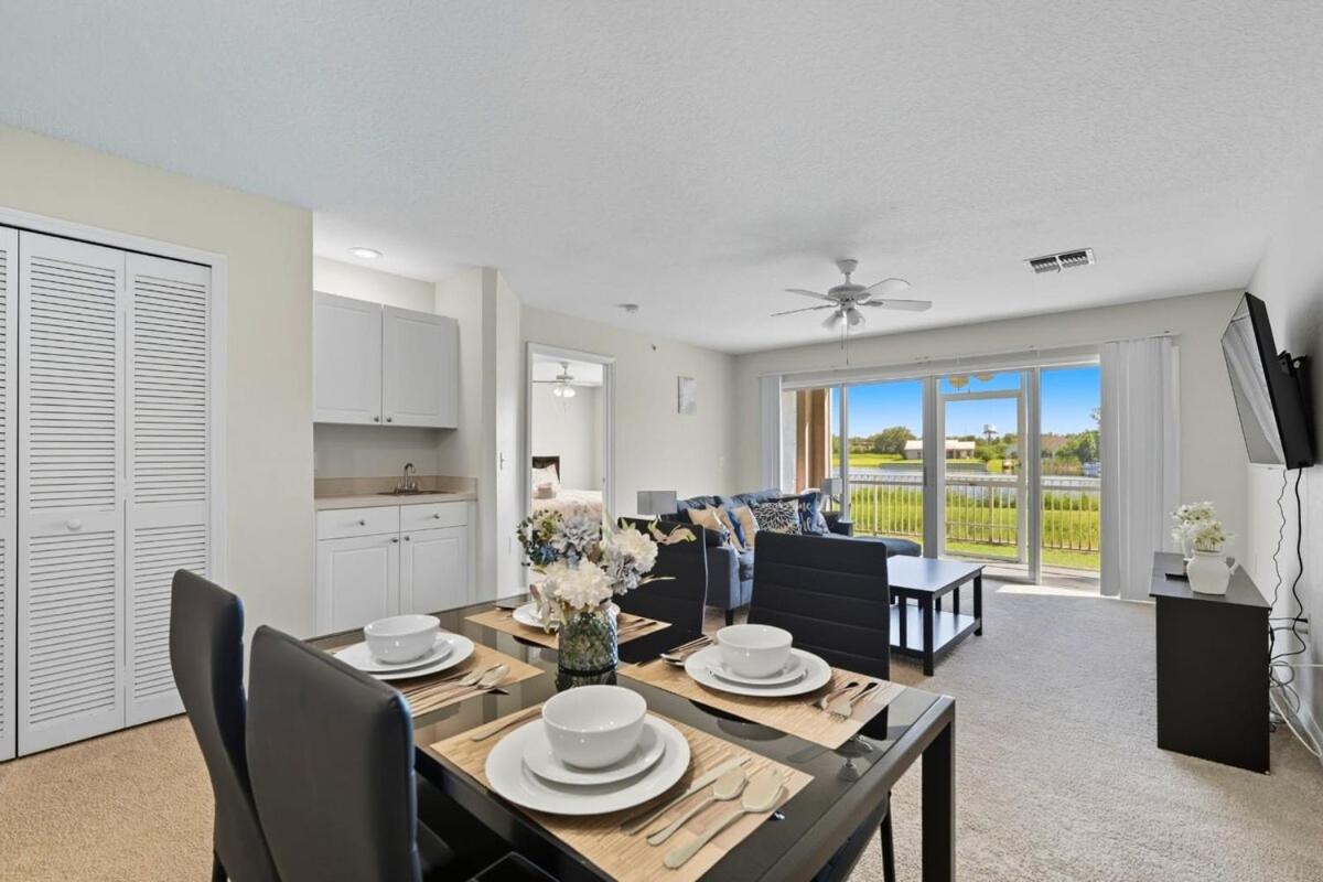 Spacious 2BR Condo Near Disney with Pool & Basketball