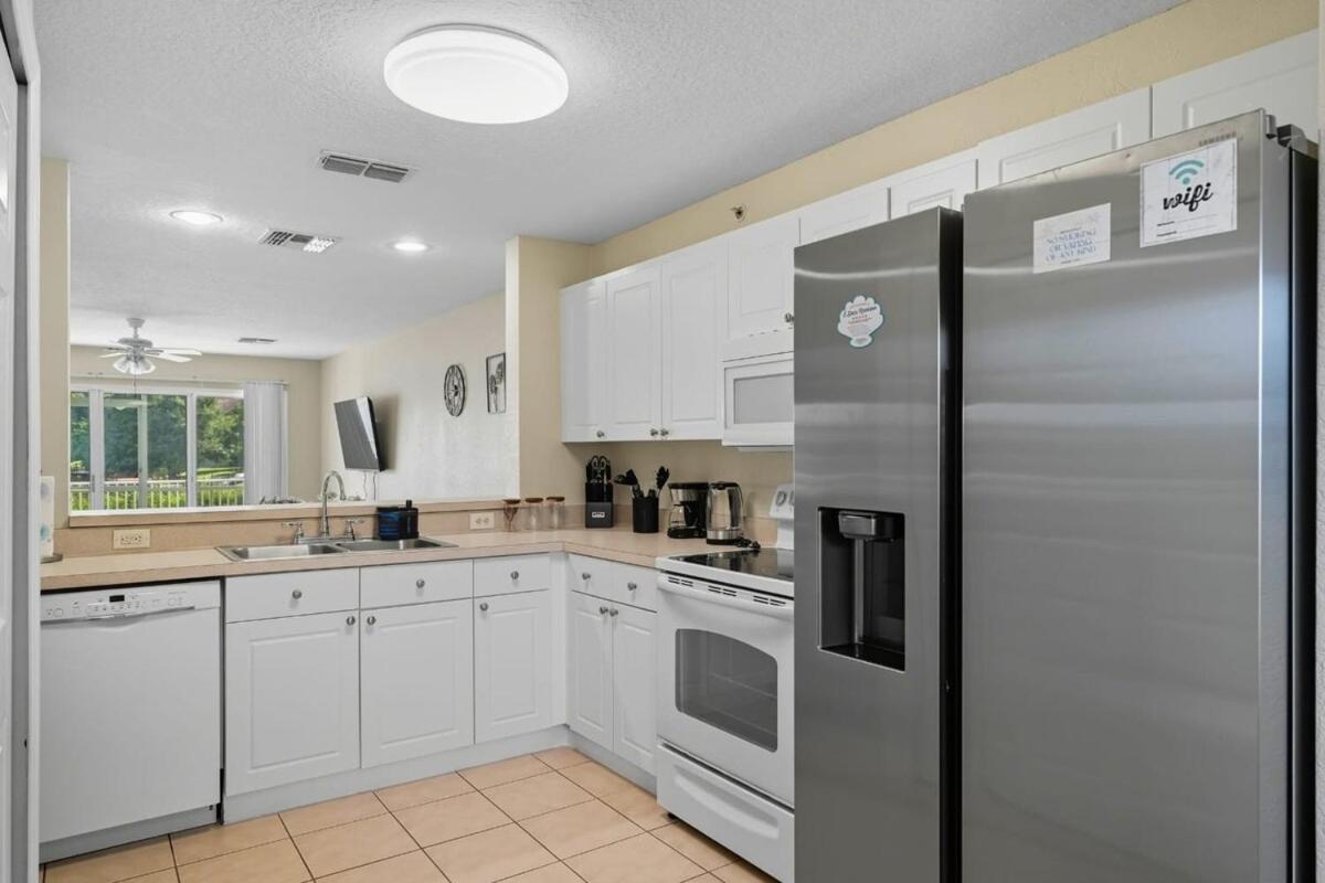 Spacious 2BR Condo Near Disney with Pool & Basketball