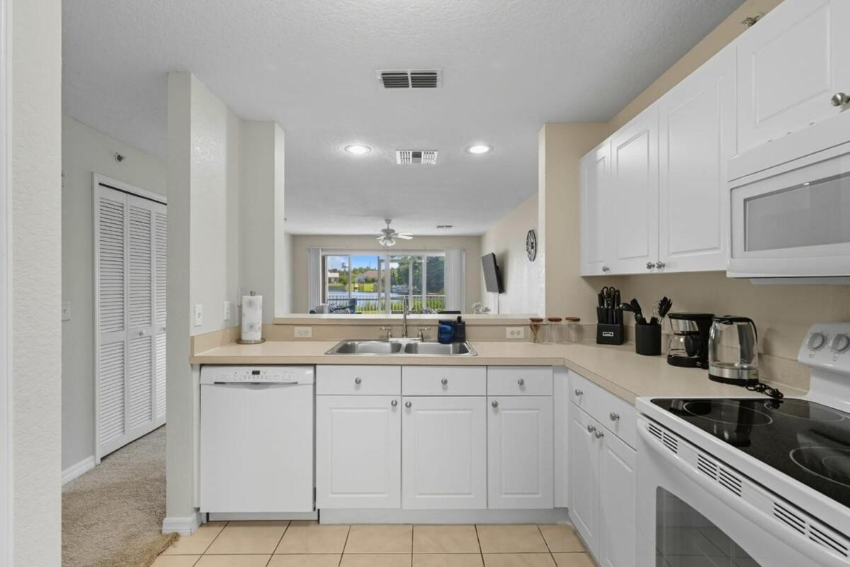 Spacious 2BR Condo Near Disney with Pool & Basketball