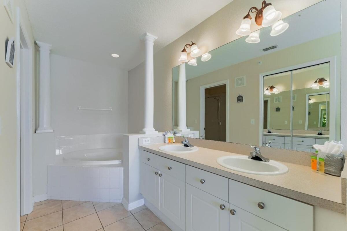 Spacious 2BR Condo Near Disney with Pool & Basketball