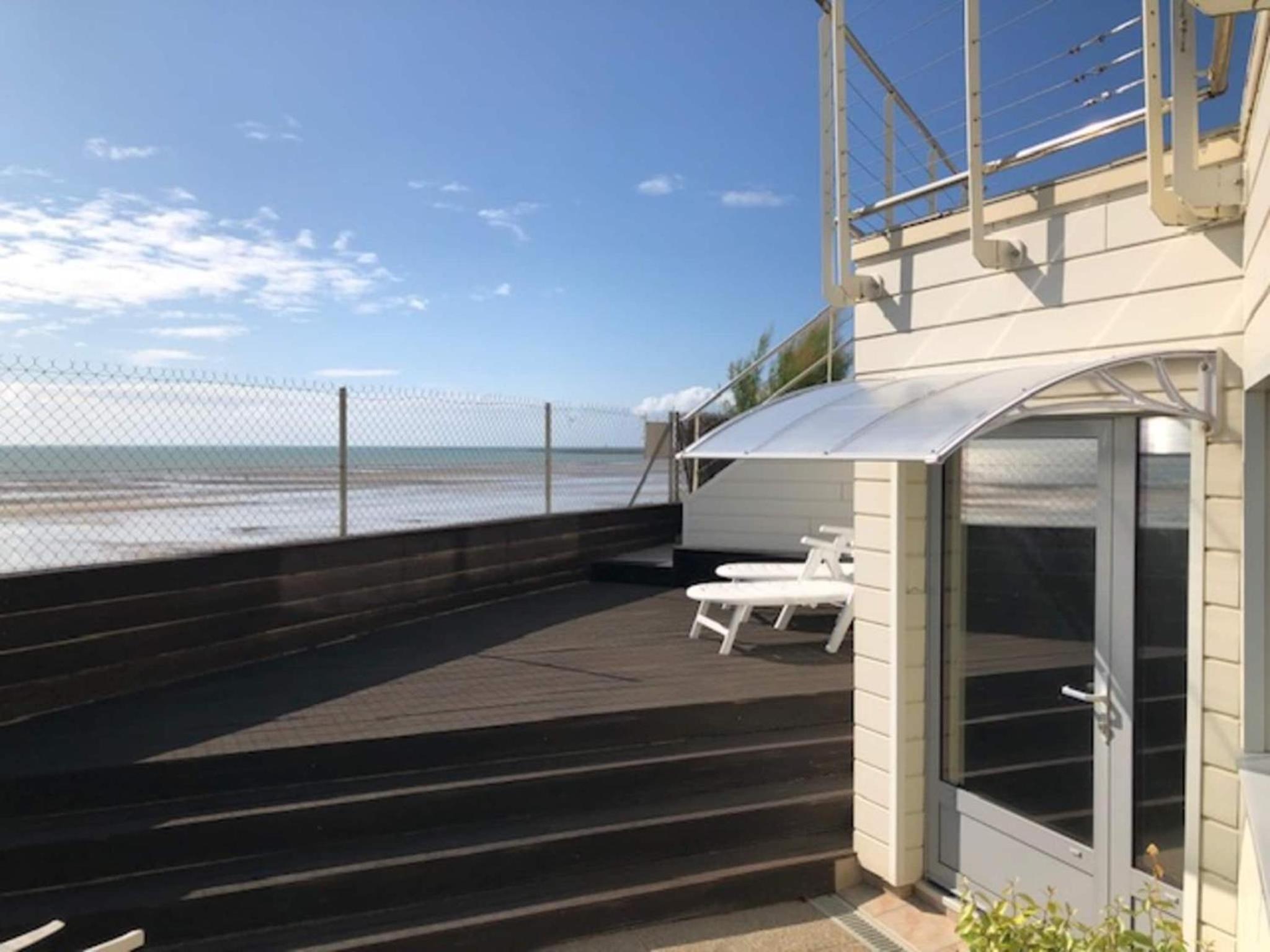 1-bedroom apartment with view of private beach