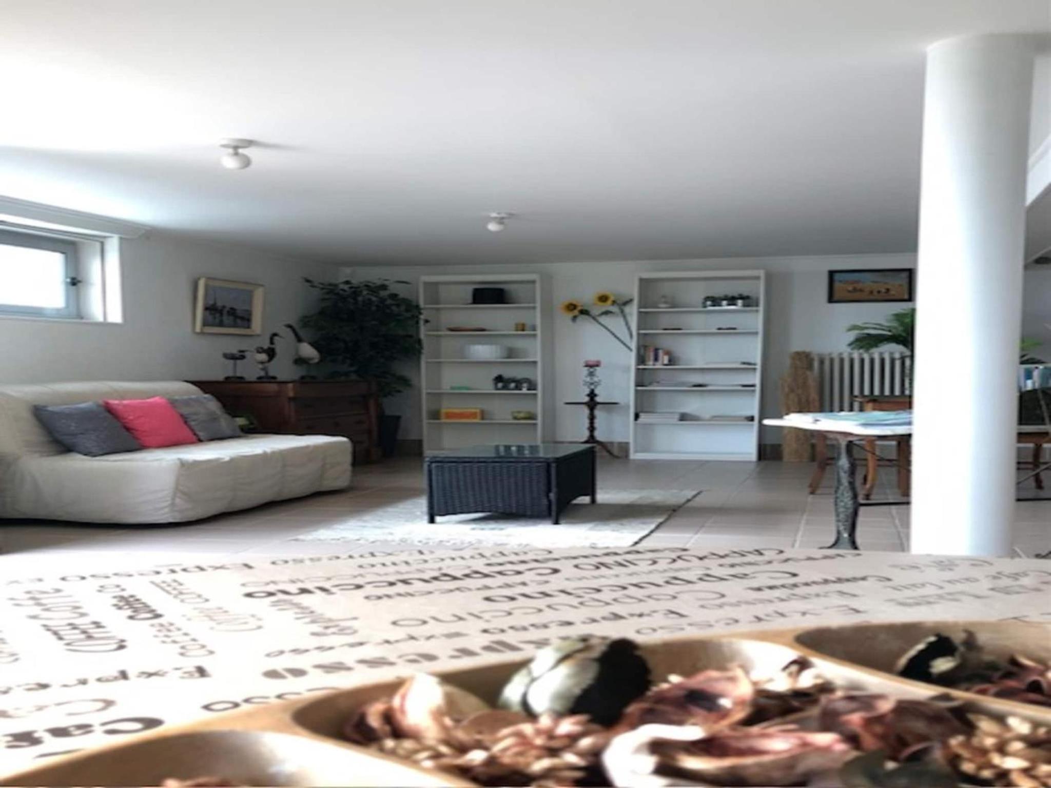 1-bedroom apartment with view of private beach