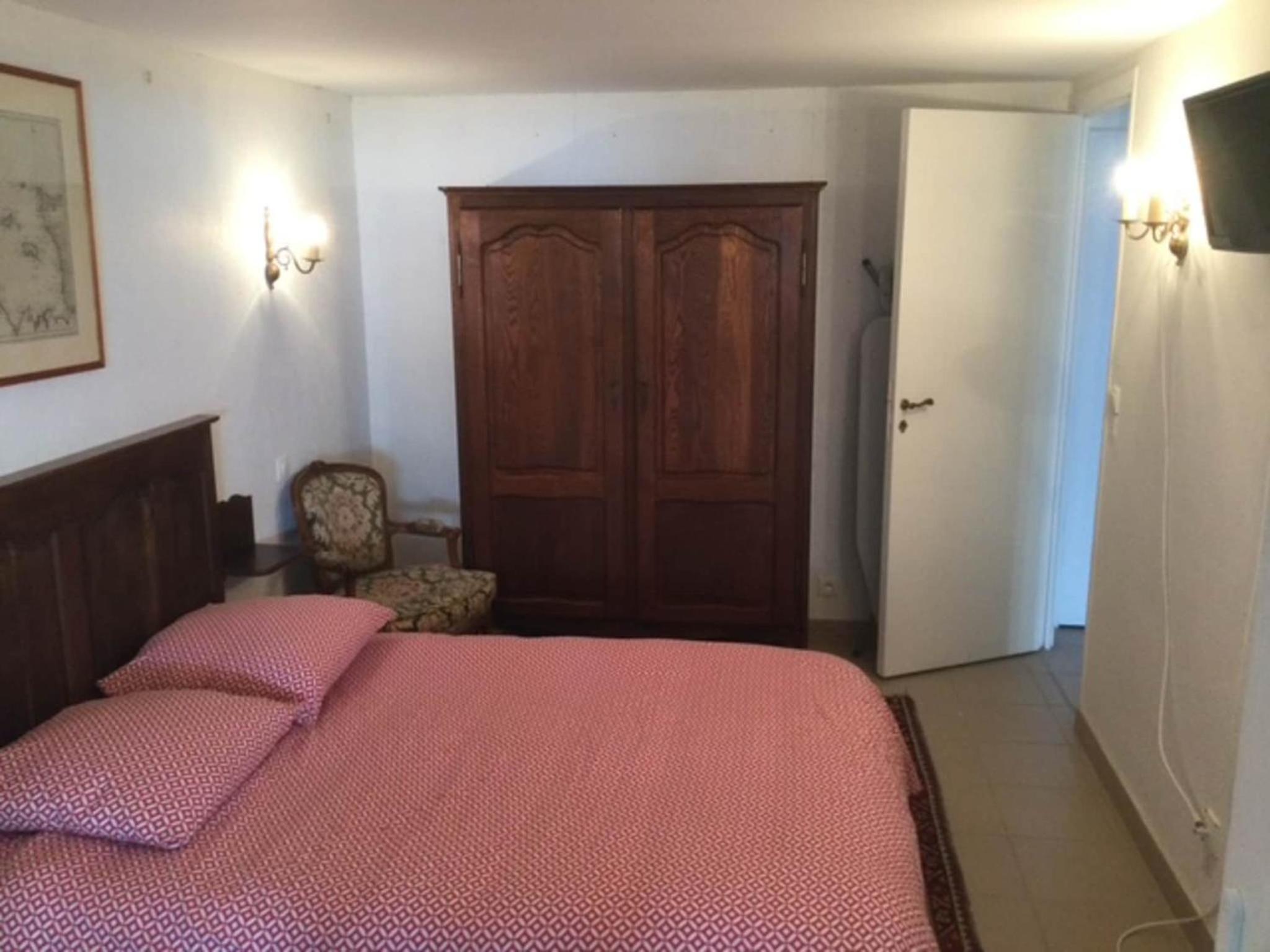 1-bedroom apartment with view of private beach