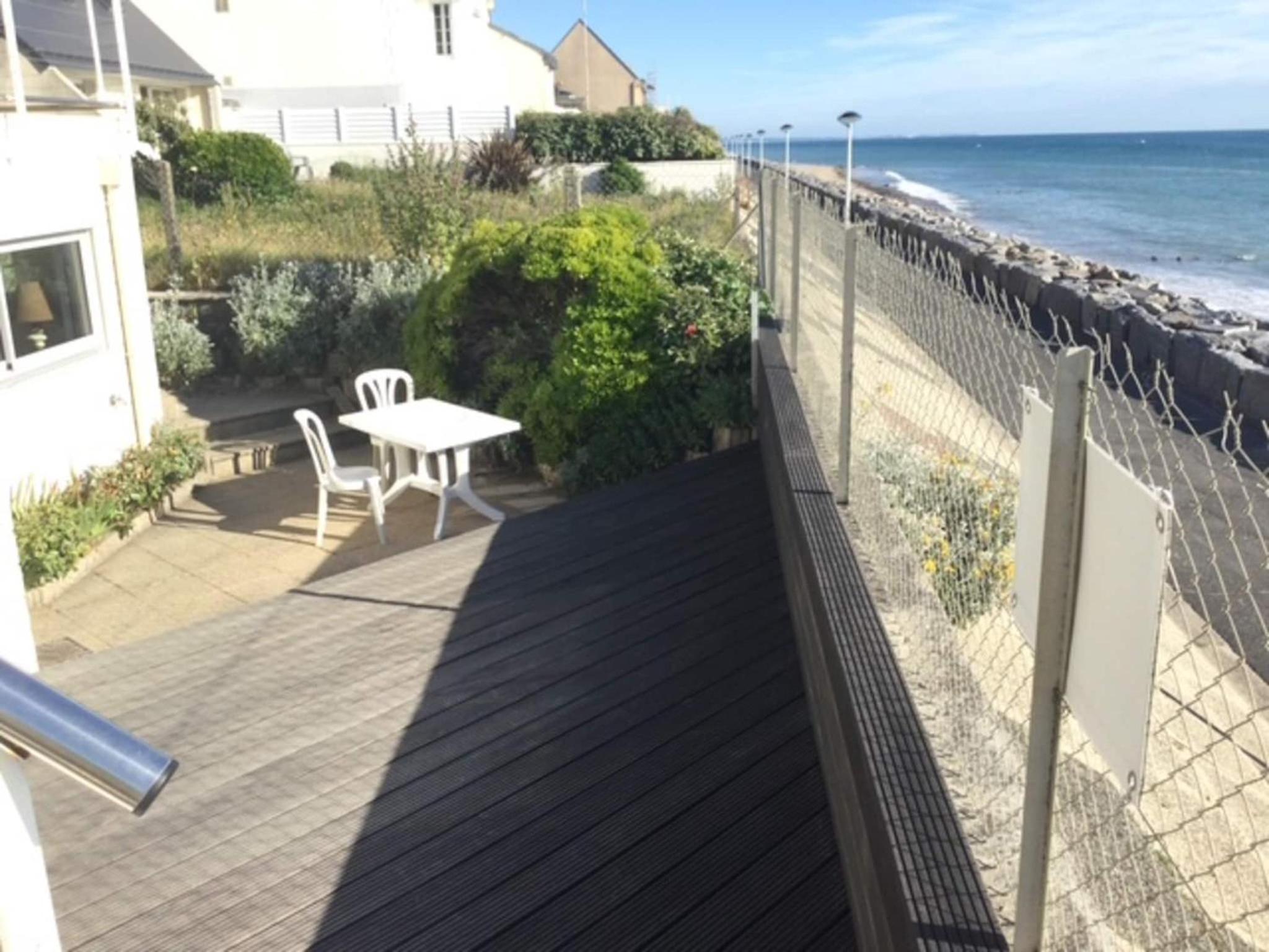 1-bedroom apartment with view of private beach