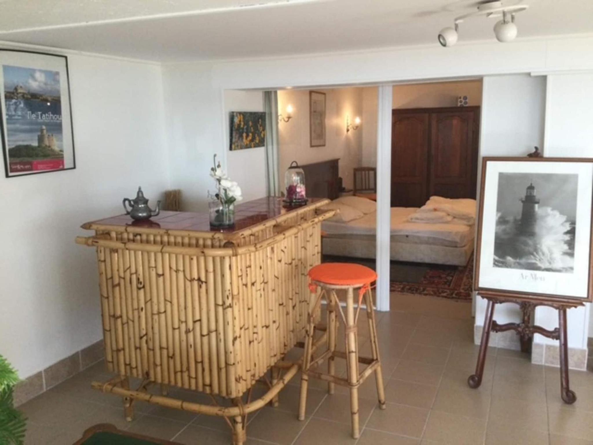 1-bedroom apartment with view of private beach