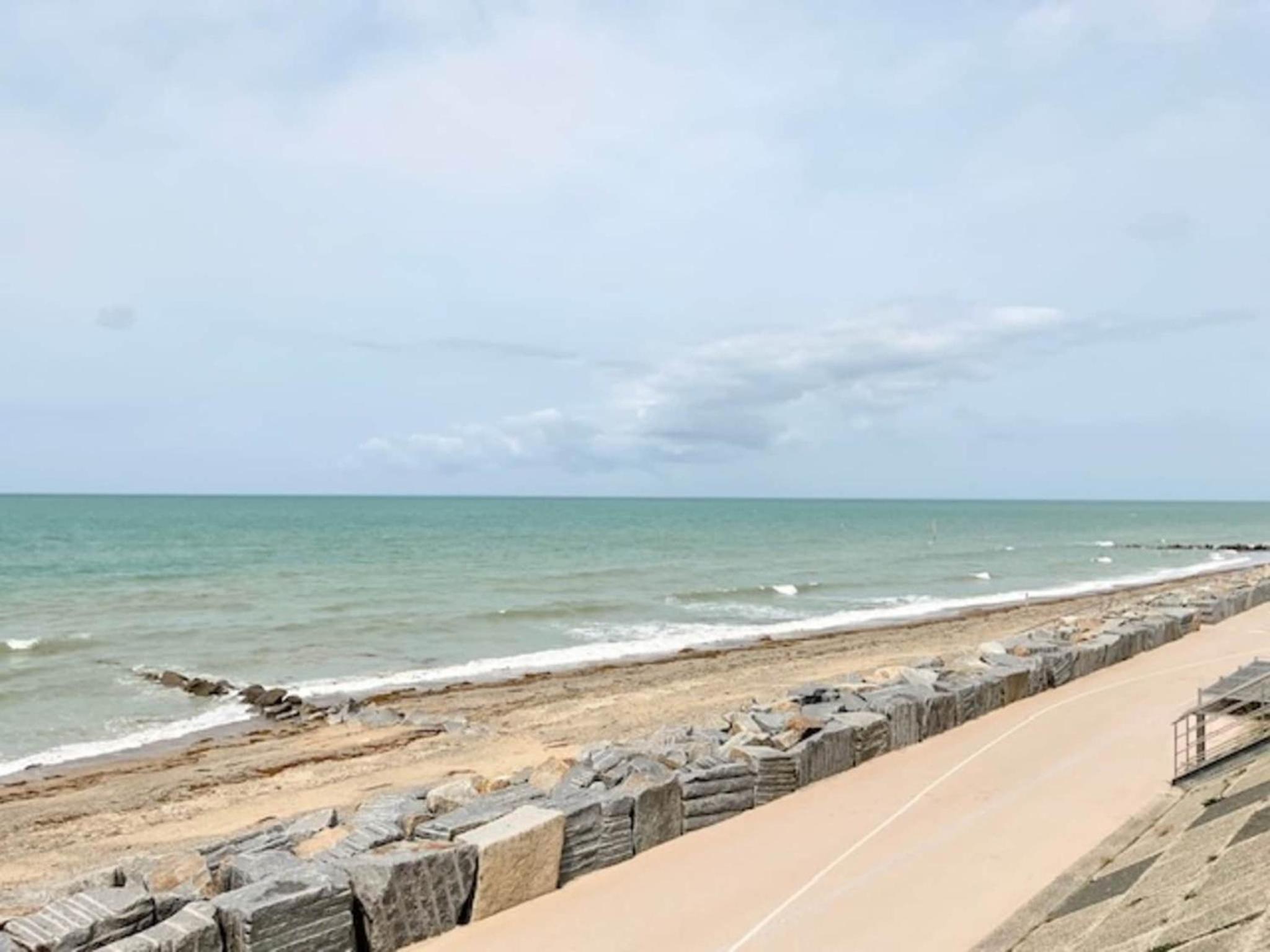 1-bedroom apartment with view of private beach