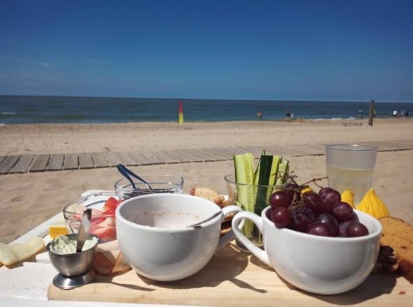 Strand en duinen 331 omheinde tuin