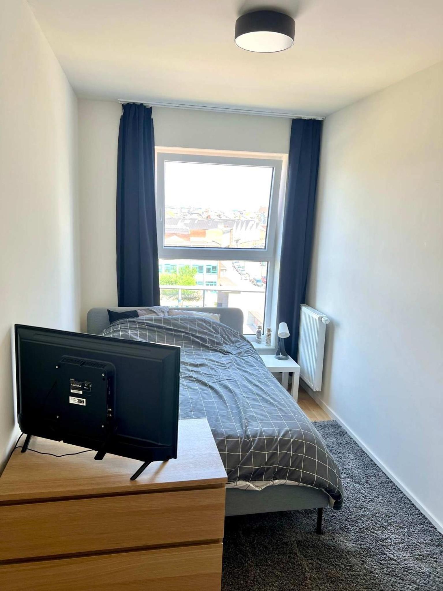 Family-Friendly Apartment Steps from Atomium - City Center 6 min
