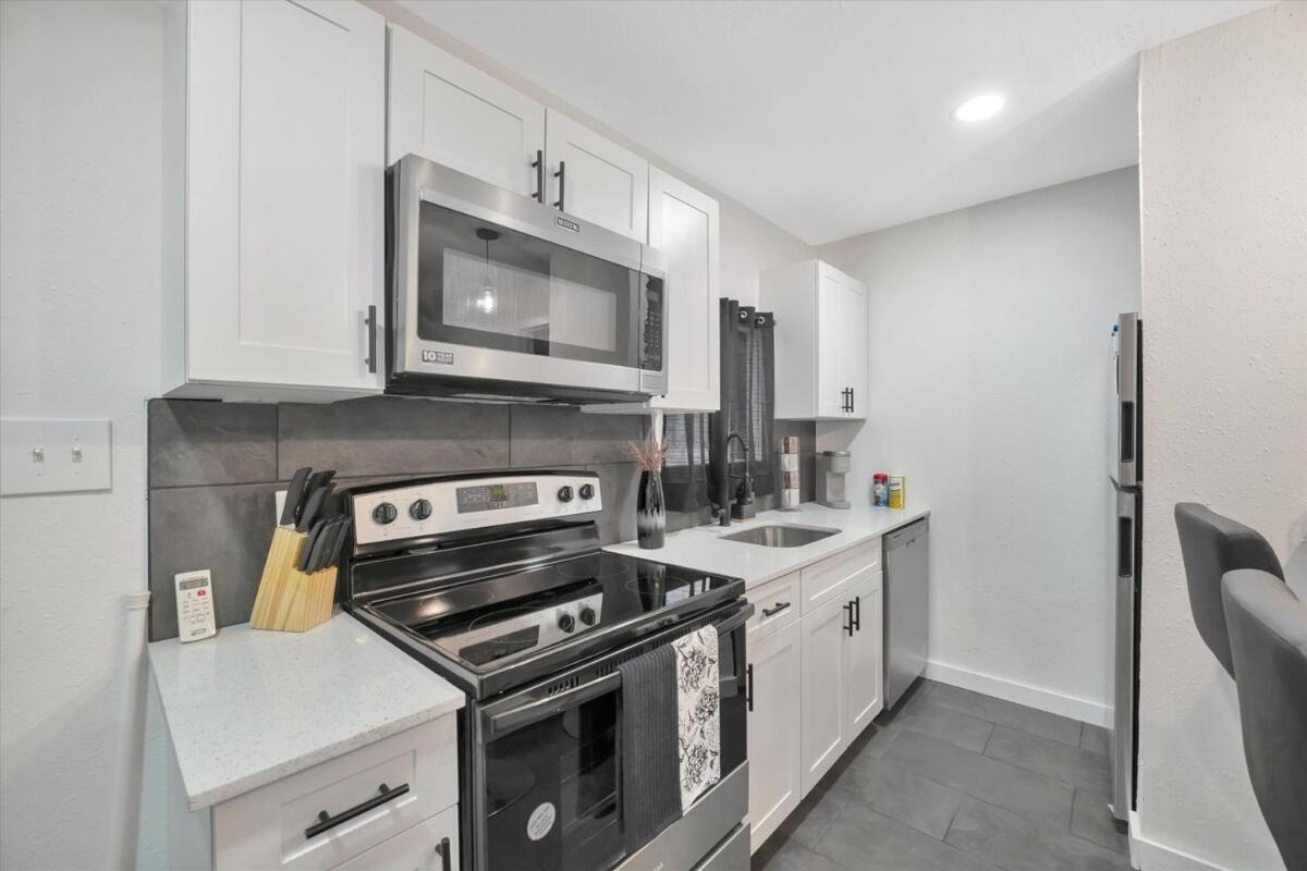Walk to Stadium, 2 Parking spots, Dog Park, BBQ