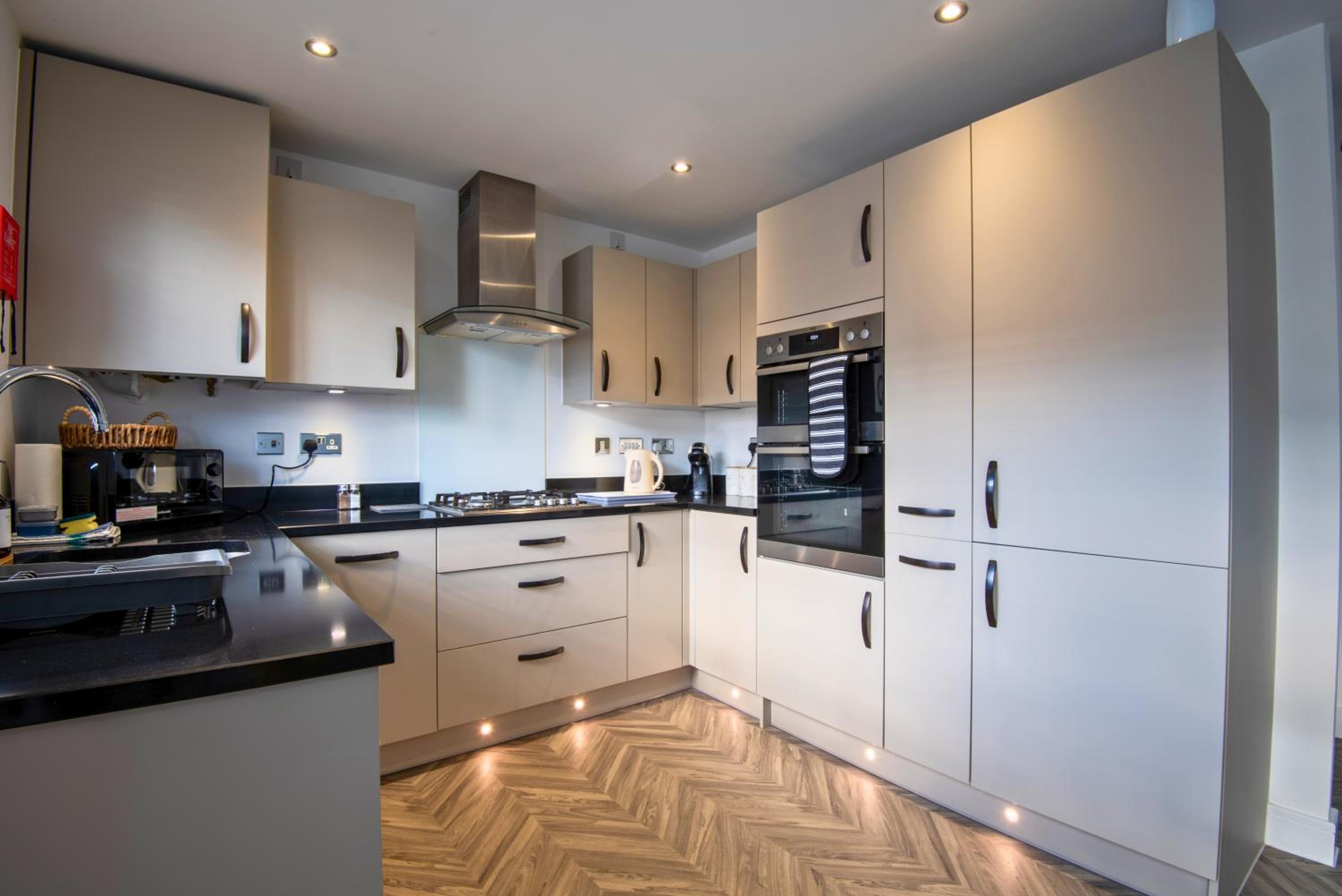 Stylish Innsworth home with garden & parking