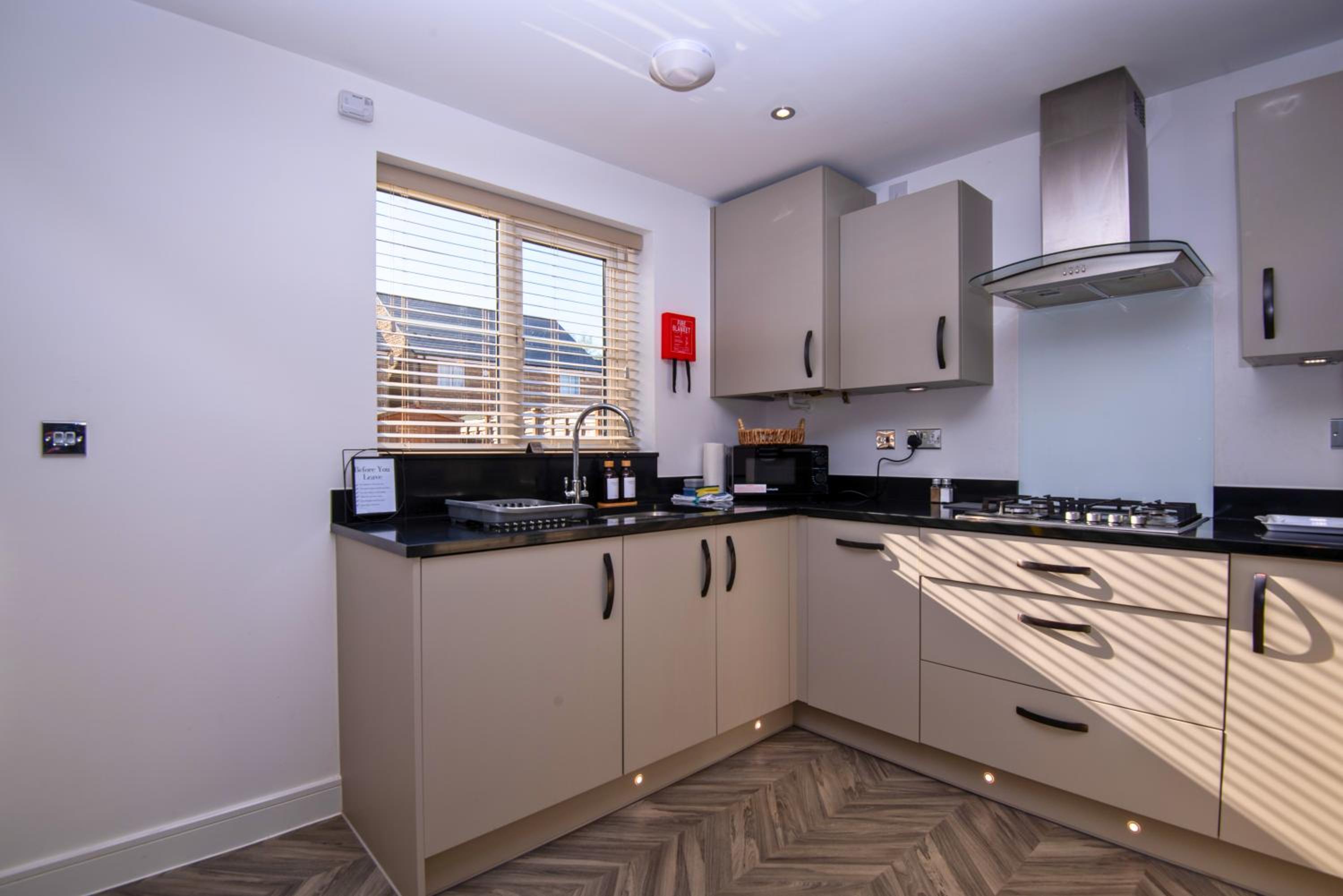 Stylish Innsworth home with garden & parking