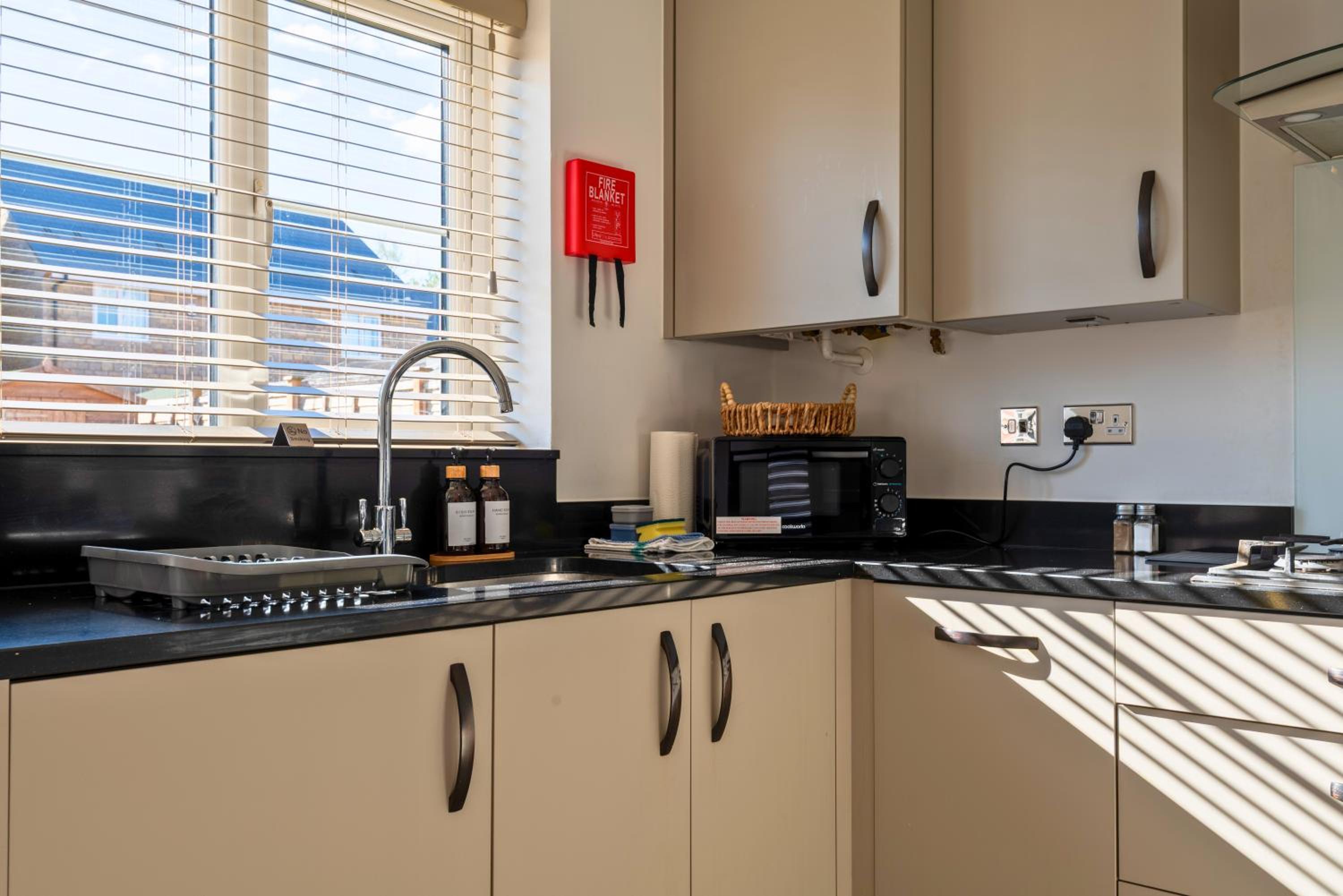 Stylish Innsworth home with garden & parking