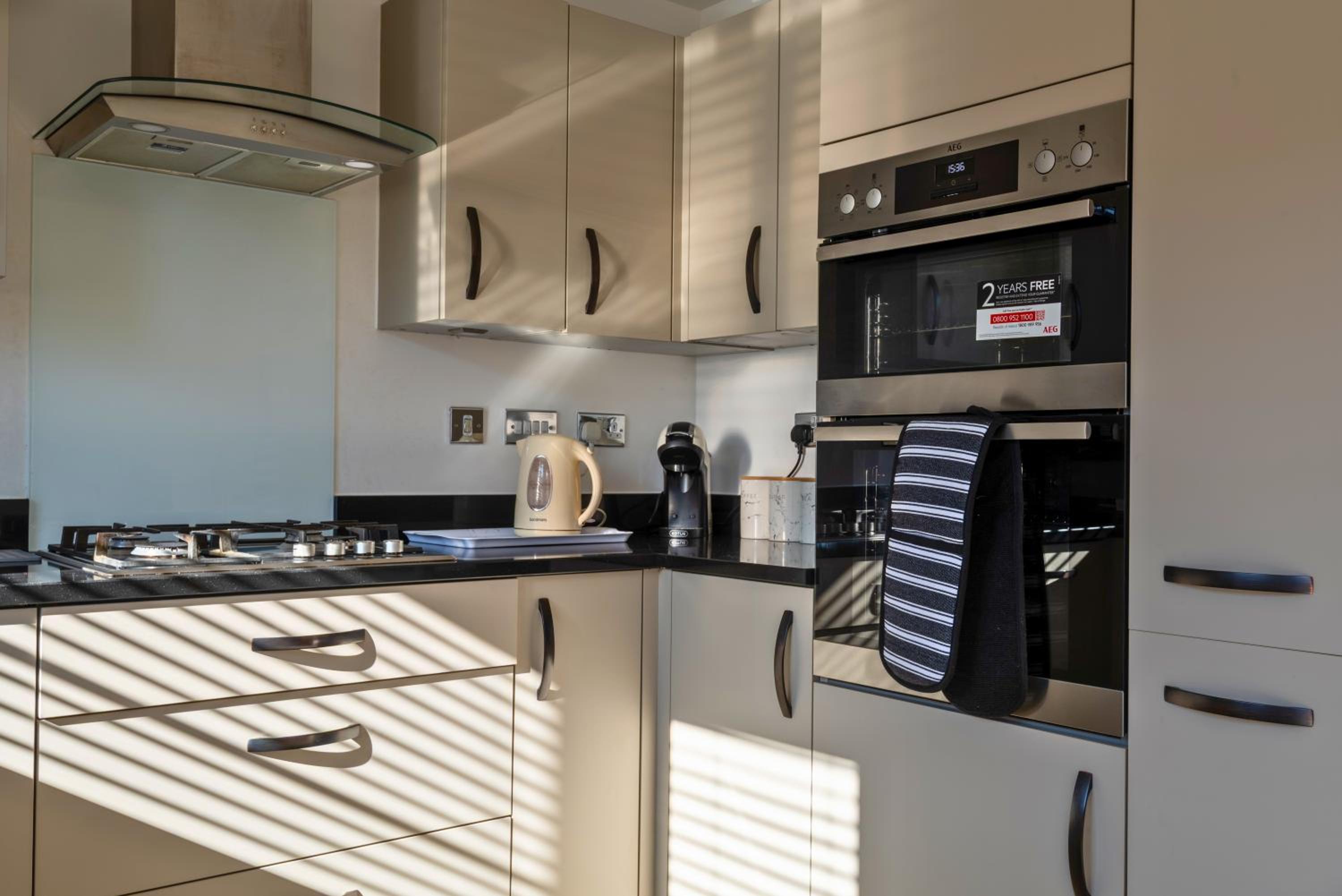 Stylish Innsworth home with garden & parking