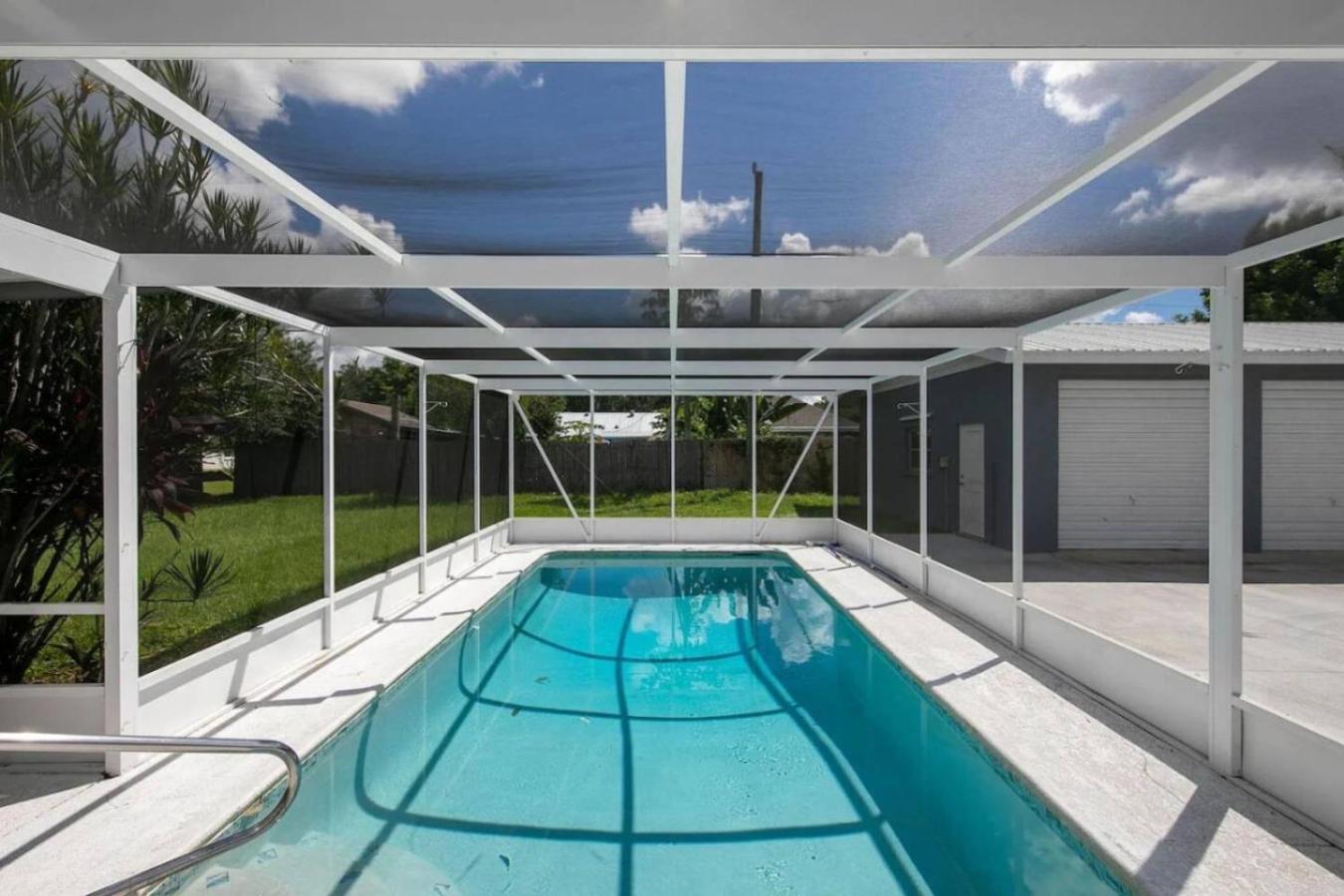 Relaxing Pool Side Home Near IMG