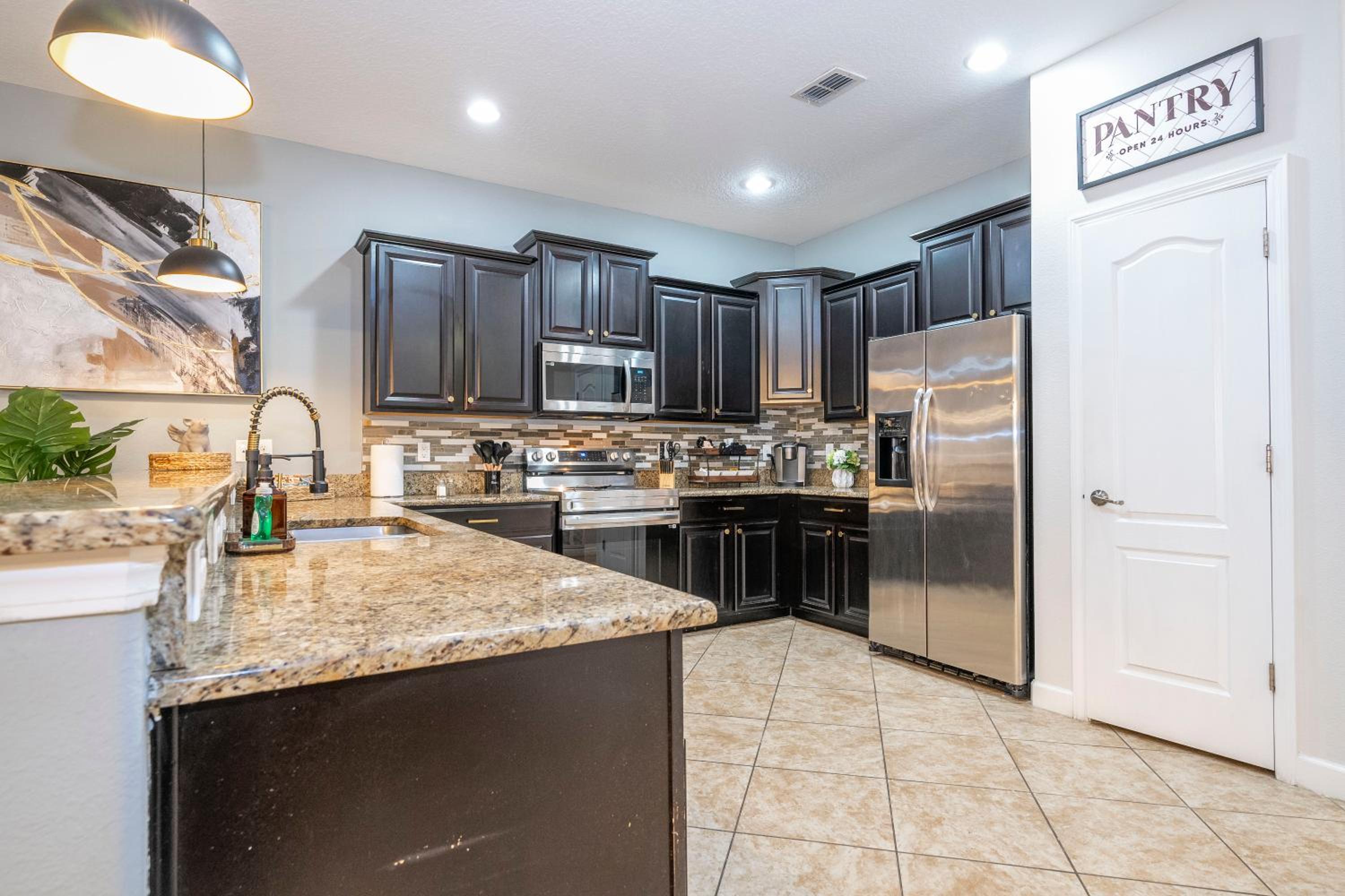 Spacious 8 bedroom home in Davenport with a private pool perfect for large groups.