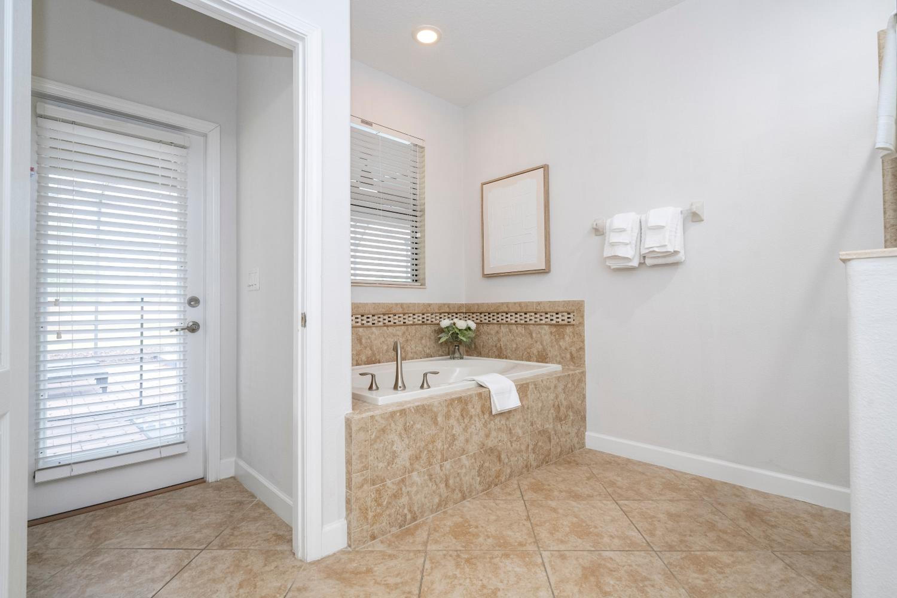 Spacious 8 bedroom home in Davenport with a private pool perfect for large groups.